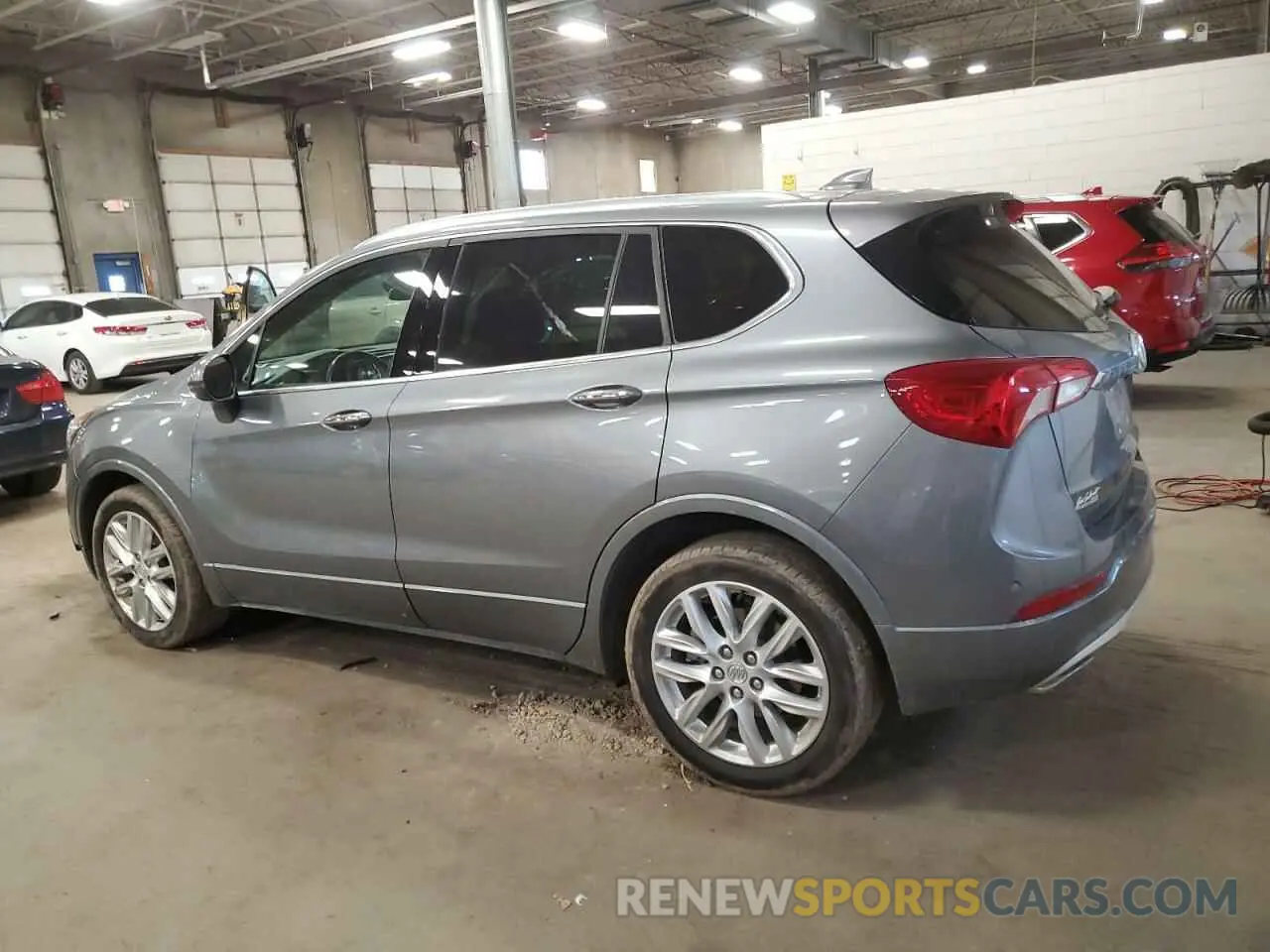 2 fotografías del automóvil dañado LRBFX4SX5LD032672 BUICK ENVISION 2020