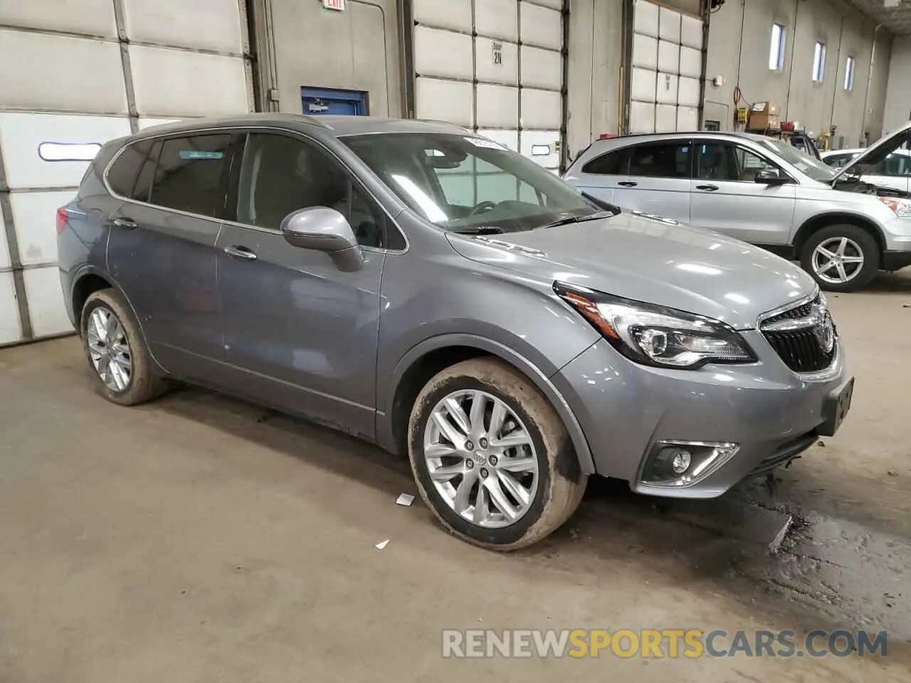 4 fotografías del automóvil dañado LRBFX4SX5LD032672 BUICK ENVISION 2020