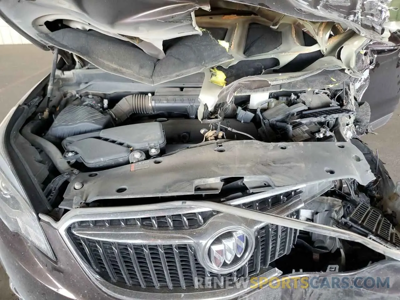 11 fotografías del automóvil dañado LRBFXBSA1LD178065 BUICK ENVISION 2020