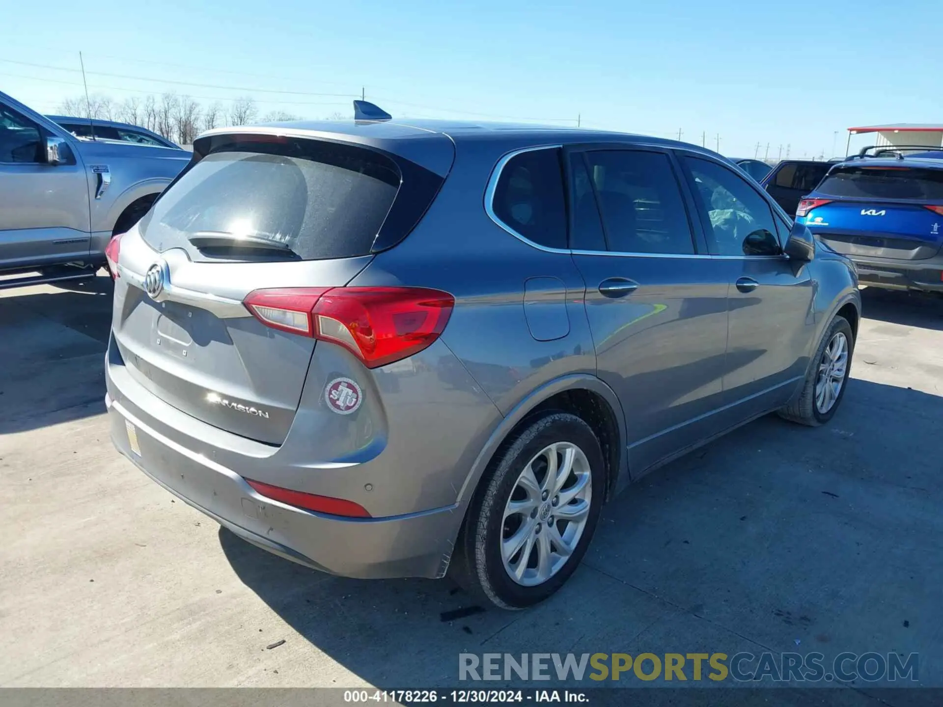 4 fotografías del automóvil dañado LRBFXBSA3LD113119 BUICK ENVISION 2020
