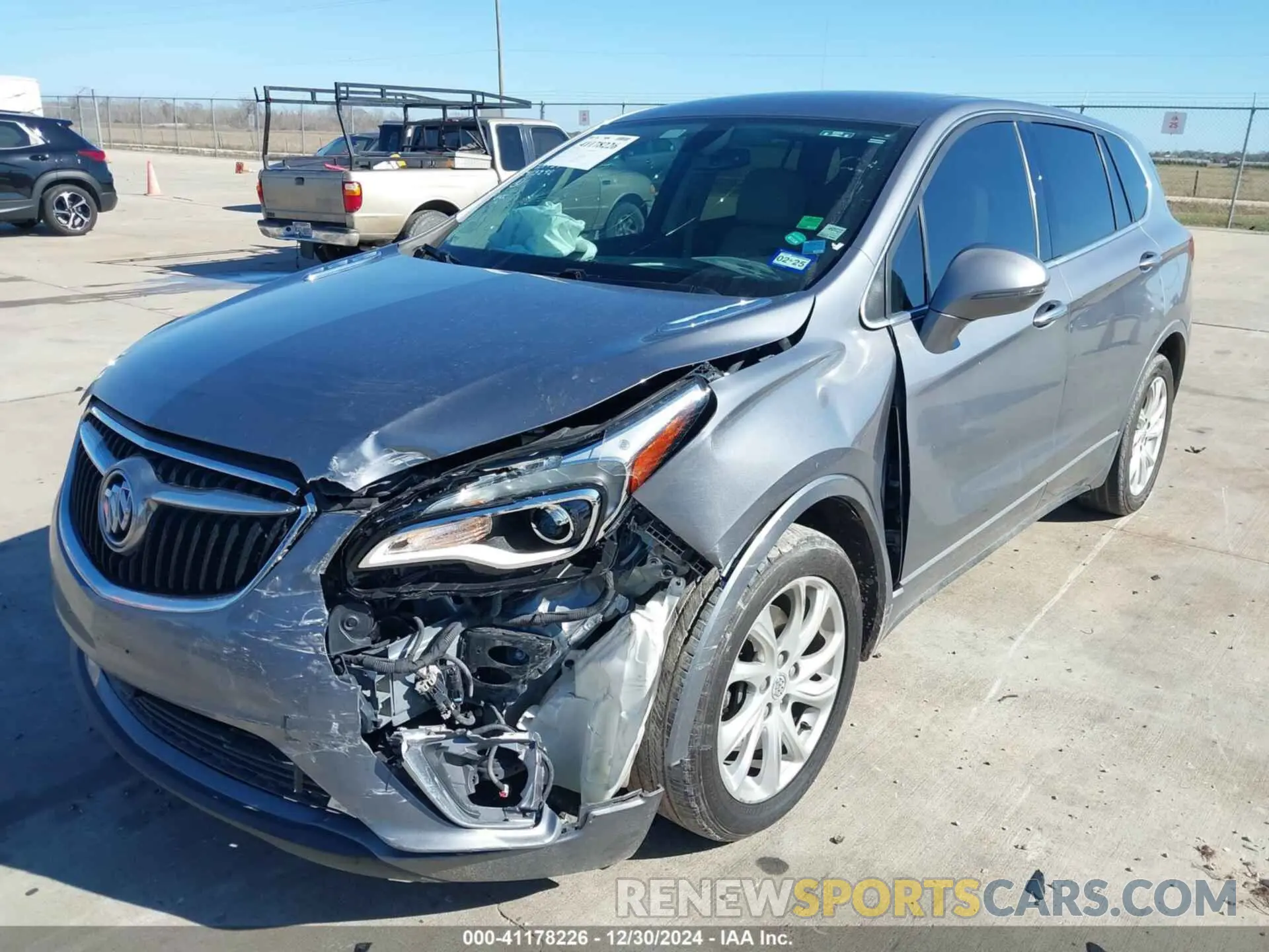6 fotografías del automóvil dañado LRBFXBSA3LD113119 BUICK ENVISION 2020