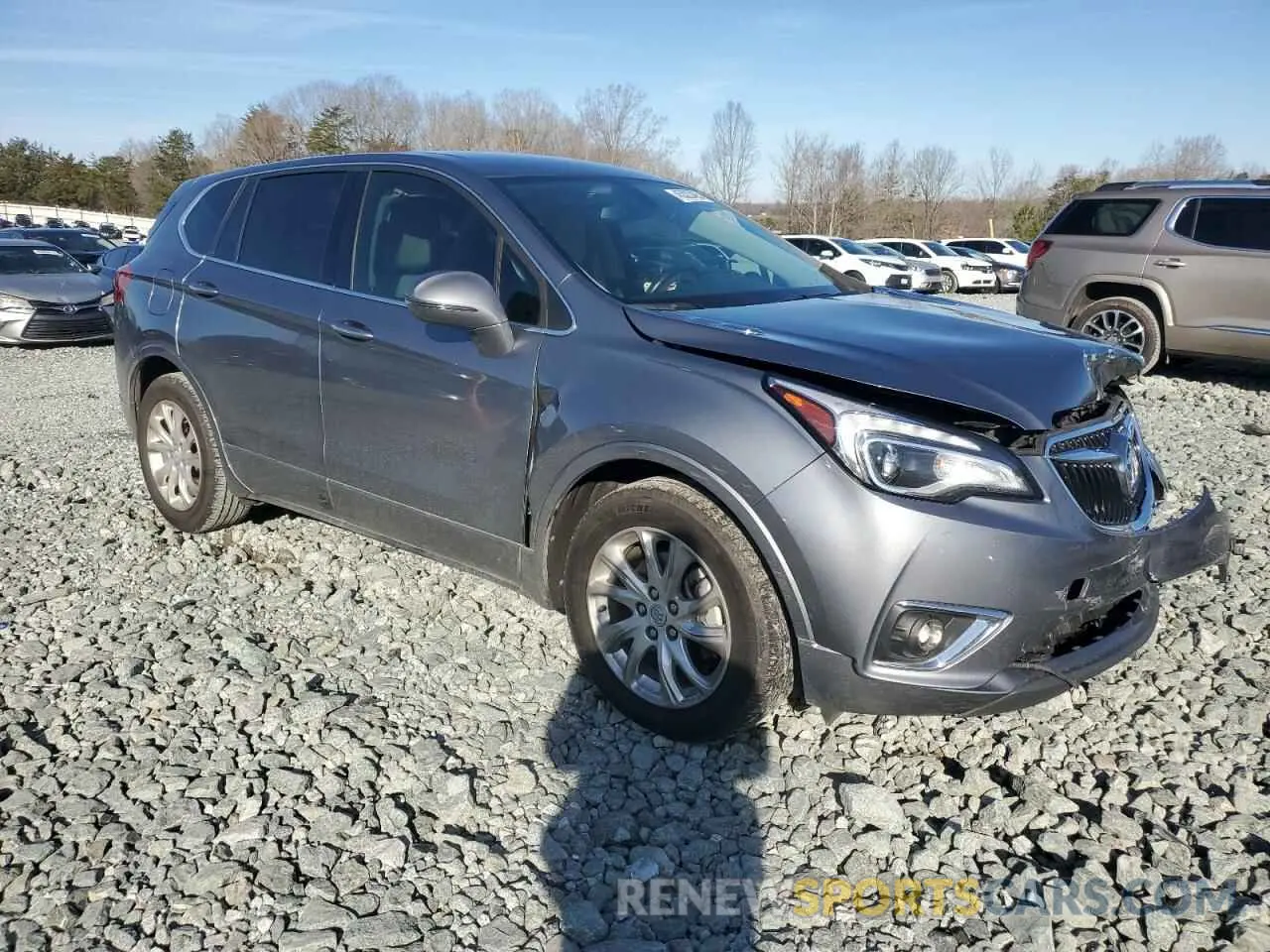 4 fotografías del automóvil dañado LRBFXBSA8LD198314 BUICK ENVISION 2020