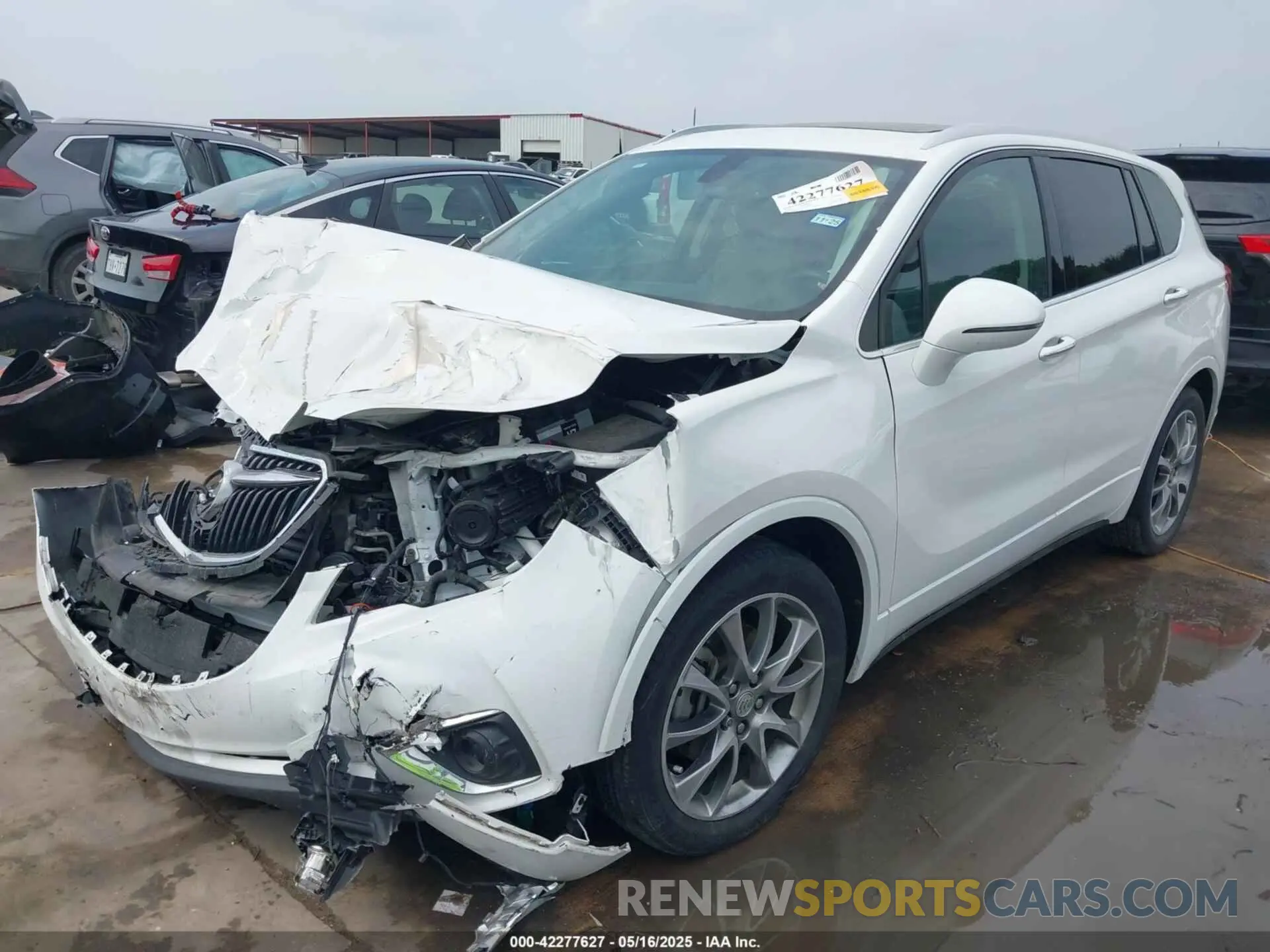 2 fotografías del automóvil dañado LRBFXCSA3LD114793 BUICK ENVISION 2020