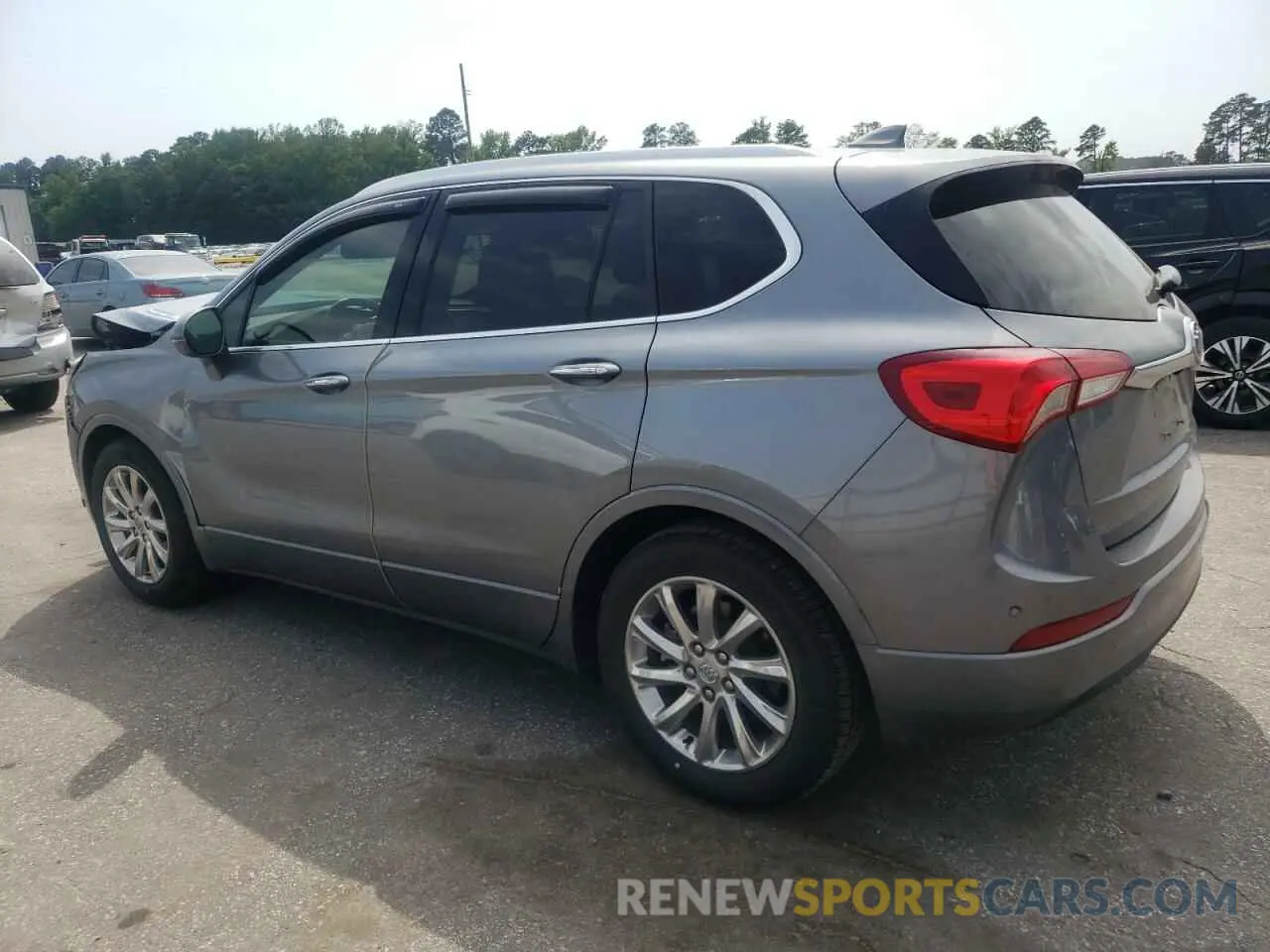 2 fotografías del automóvil dañado LRBFXCSA9LD052512 BUICK ENVISION 2020