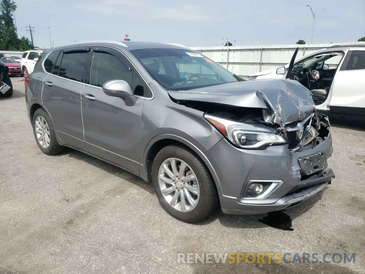 4 fotografías del automóvil dañado LRBFXCSA9LD052512 BUICK ENVISION 2020