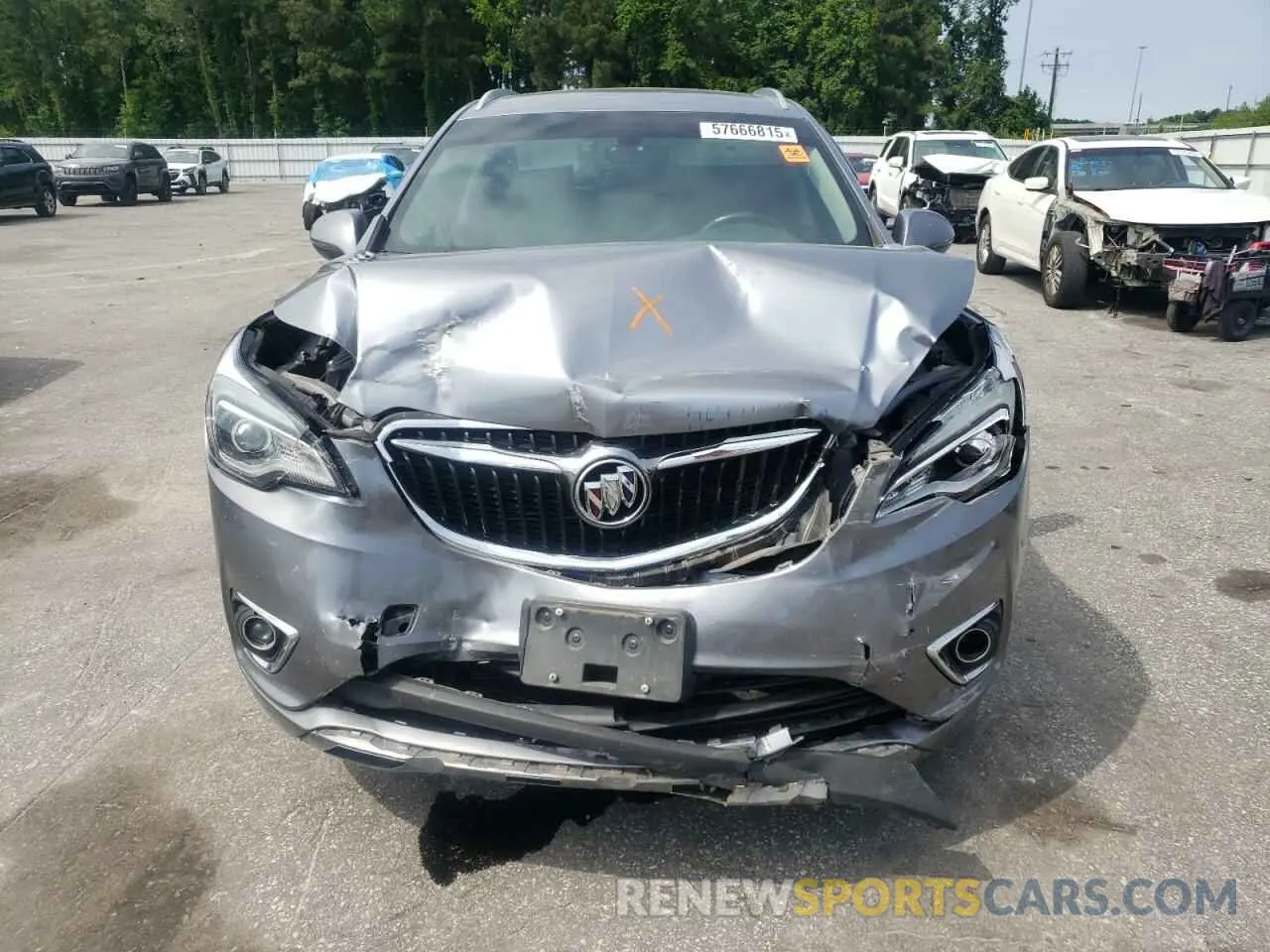 5 fotografías del automóvil dañado LRBFXCSA9LD052512 BUICK ENVISION 2020