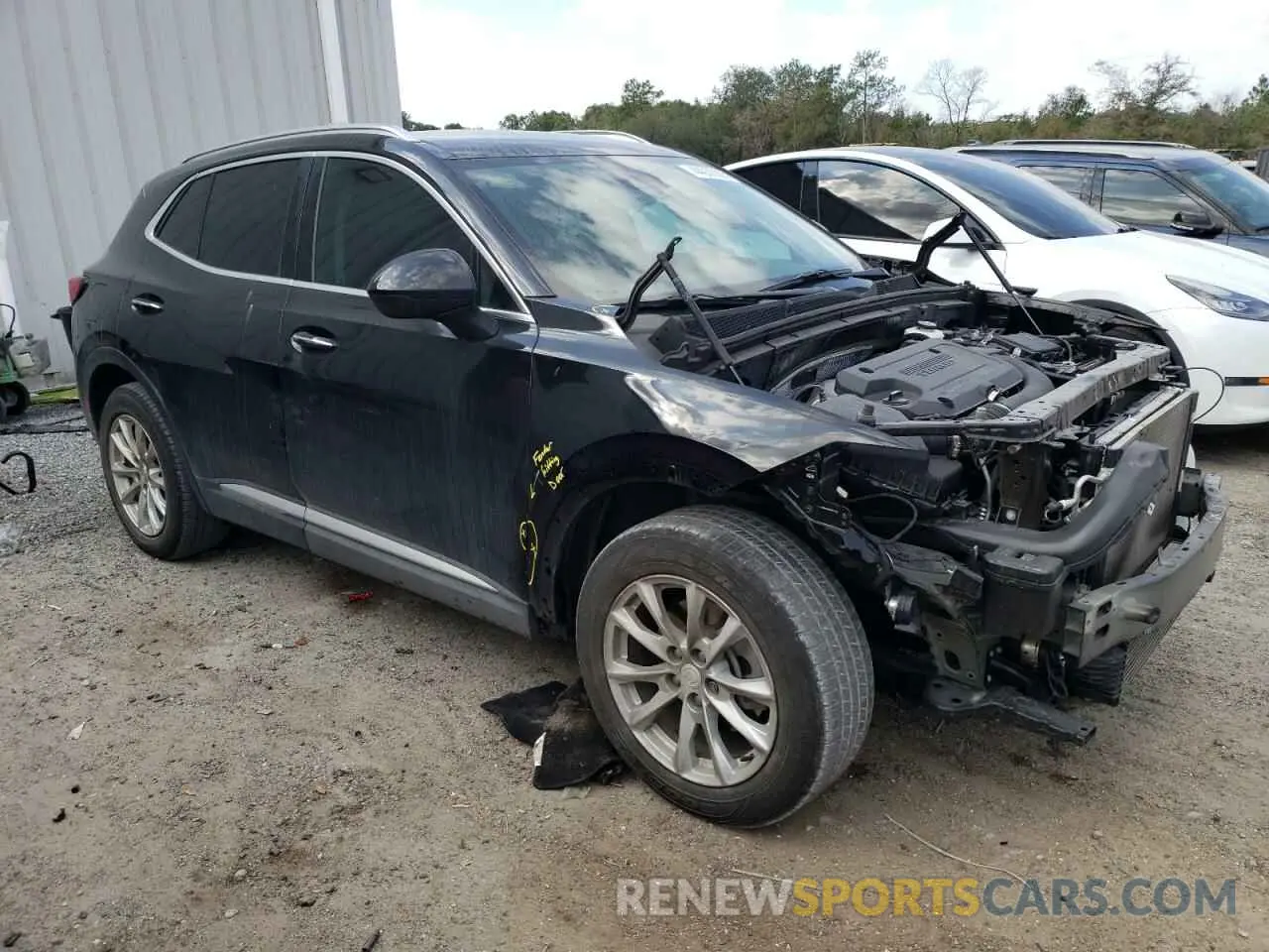 4 fotografías del automóvil dañado LRBAZLR48MD063216 BUICK ENVISION 2021