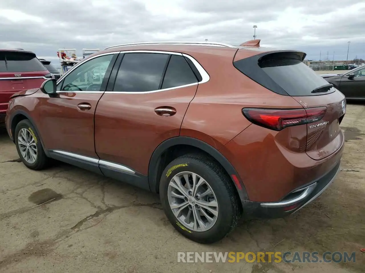 2 fotografías del automóvil dañado LRBAZLR41ND126979 BUICK ENVISION 2022