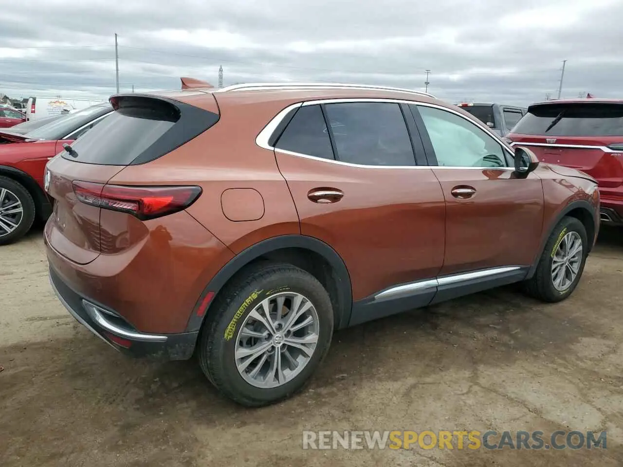 3 fotografías del automóvil dañado LRBAZLR41ND126979 BUICK ENVISION 2022