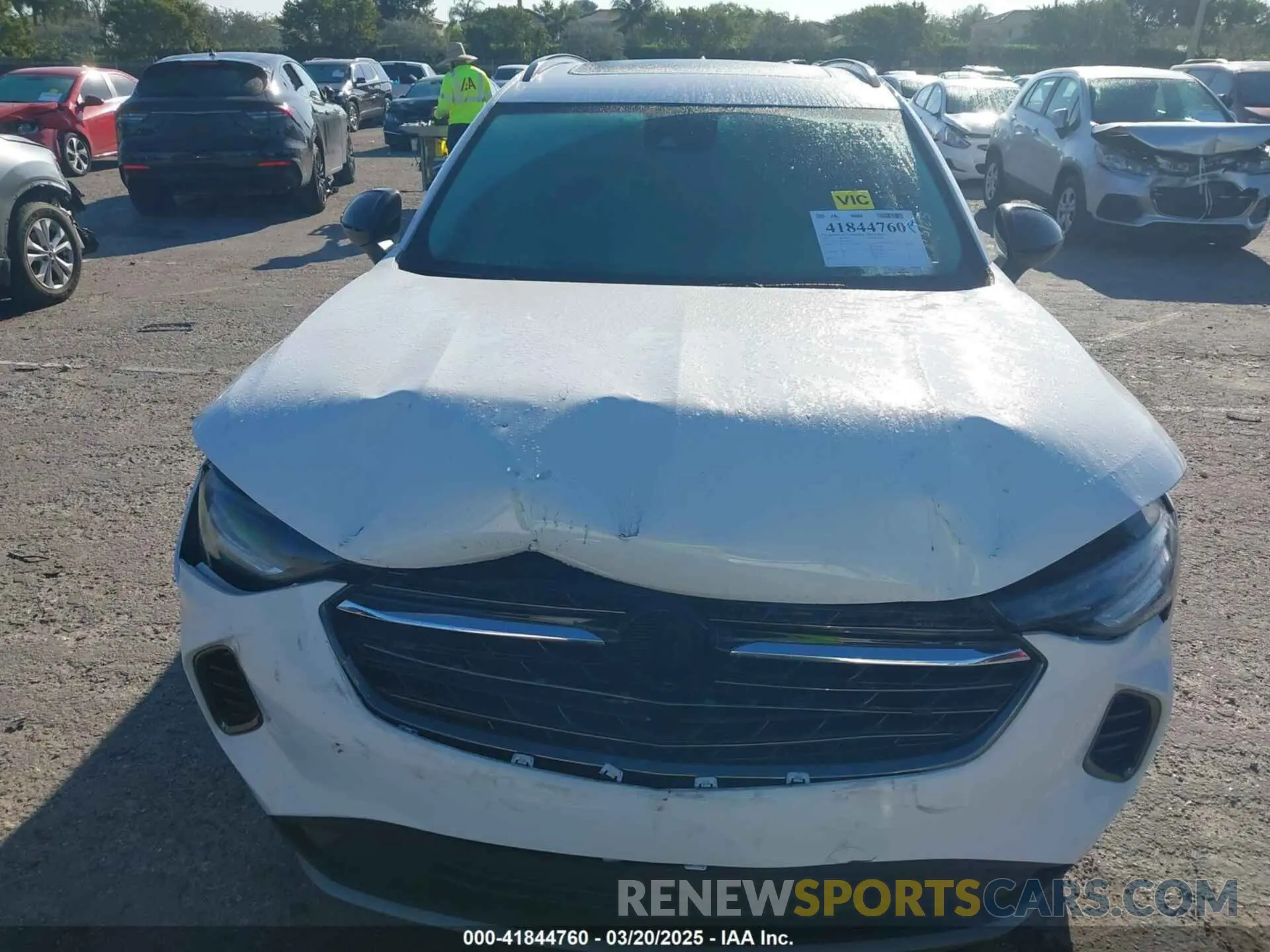 12 fotografías del automóvil dañado LRBAZLR46ND065564 BUICK ENVISION 2022
