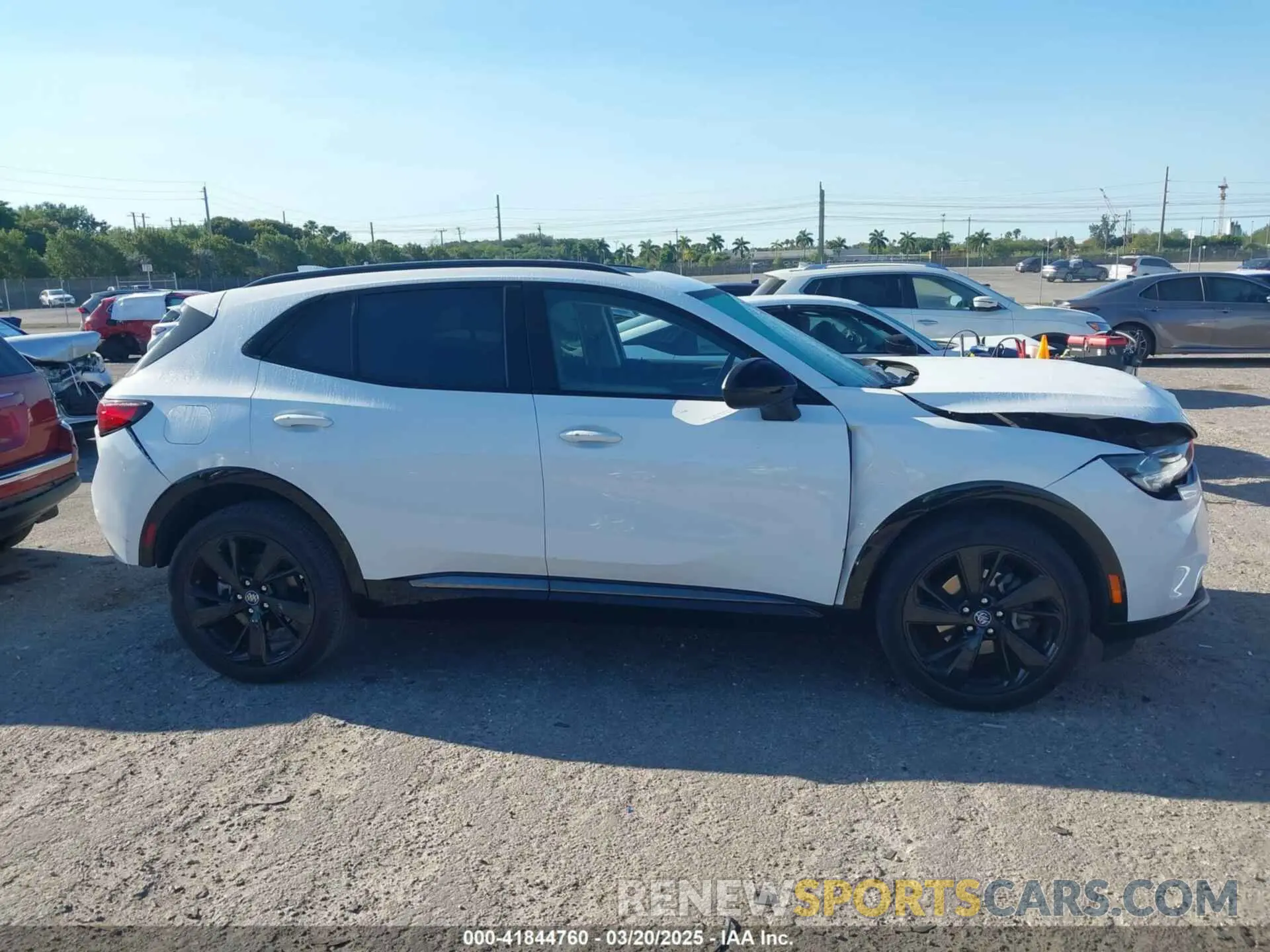 13 fotografías del automóvil dañado LRBAZLR46ND065564 BUICK ENVISION 2022