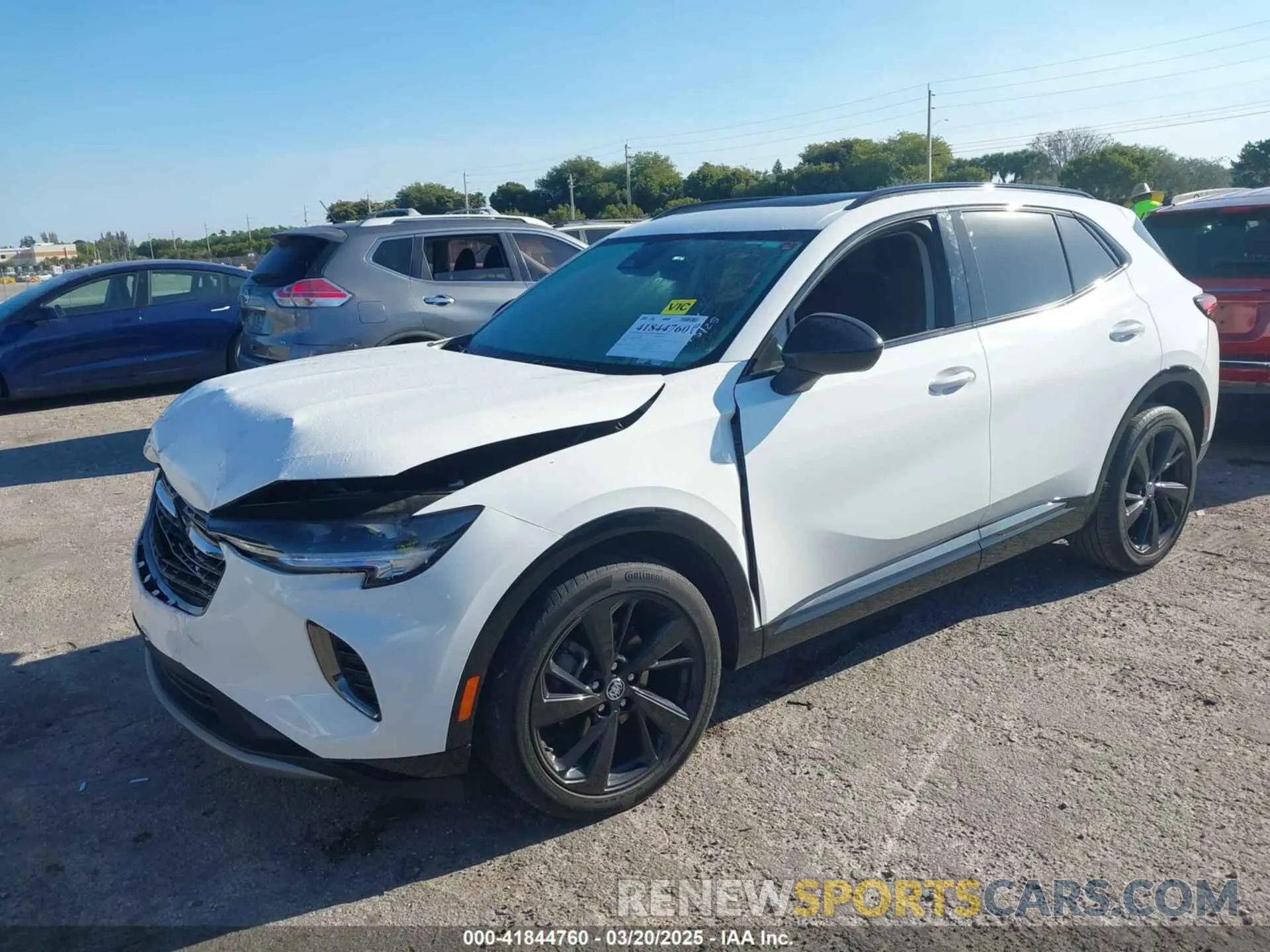 2 fotografías del automóvil dañado LRBAZLR46ND065564 BUICK ENVISION 2022