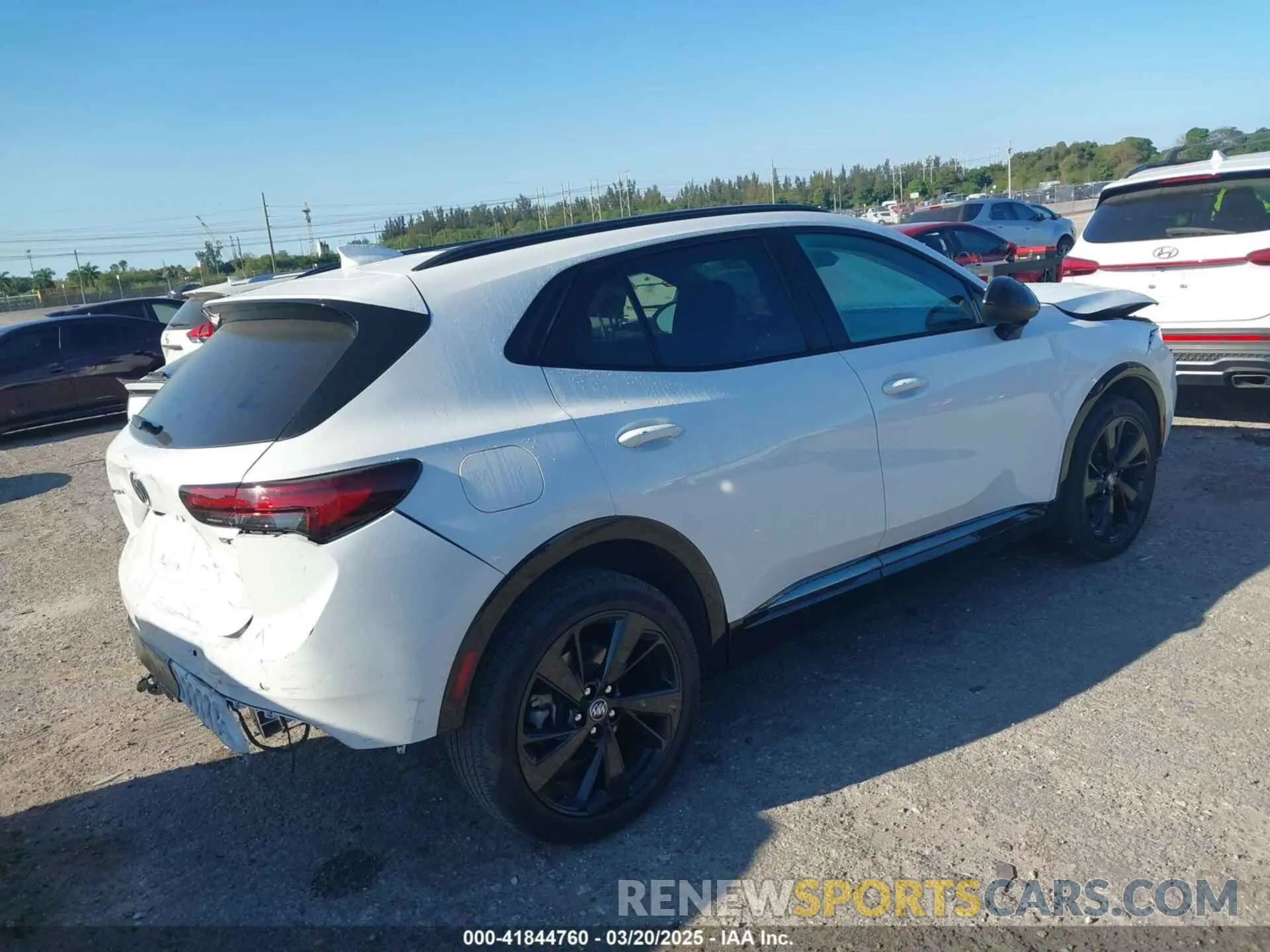 4 fotografías del automóvil dañado LRBAZLR46ND065564 BUICK ENVISION 2022