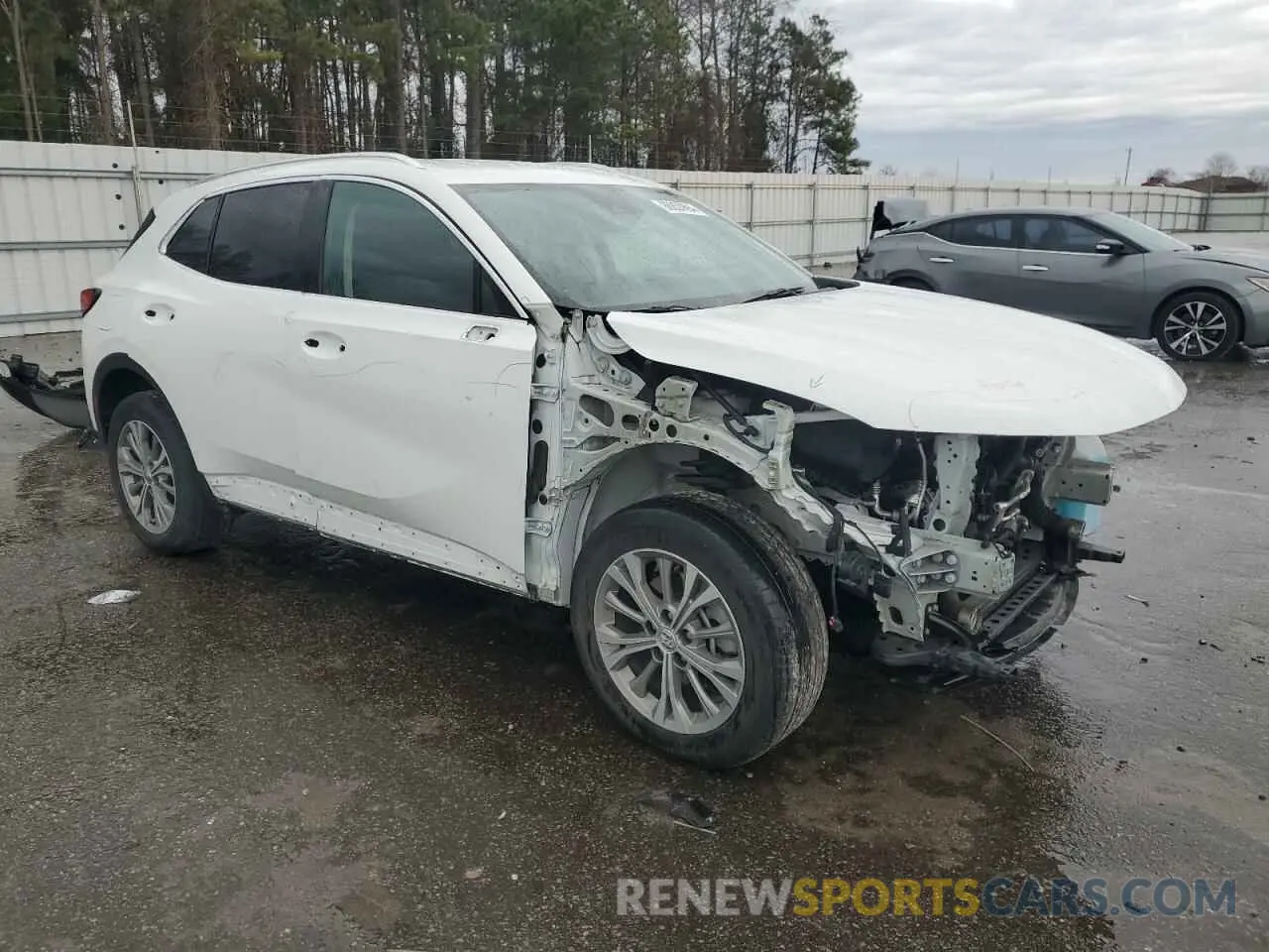 4 fotografías del automóvil dañado LRBAZLR47ND029575 BUICK ENVISION 2022