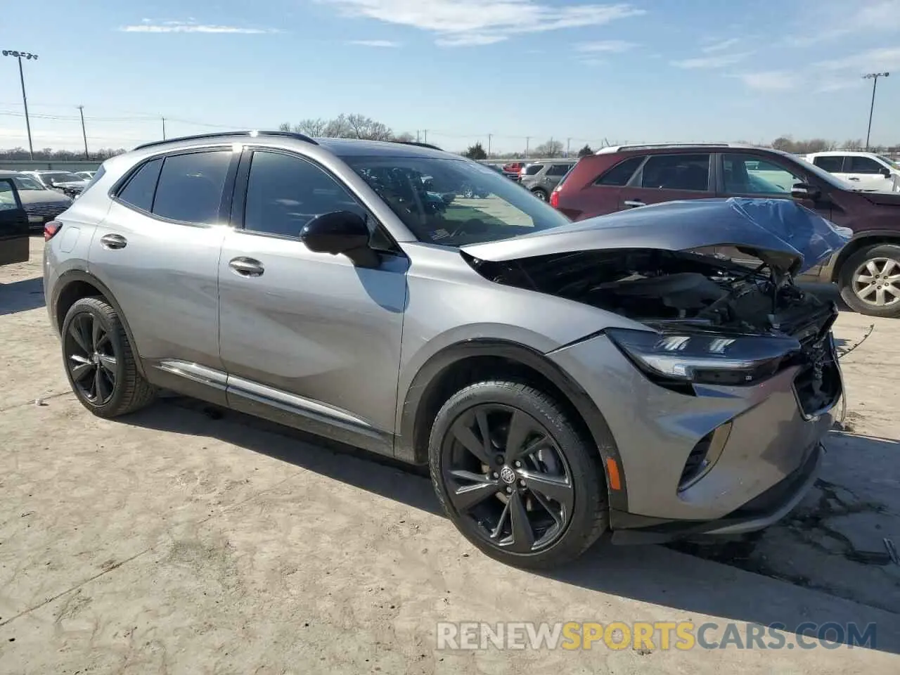 4 fotografías del automóvil dañado LRBFZNR47ND053473 BUICK ENVISION 2022
