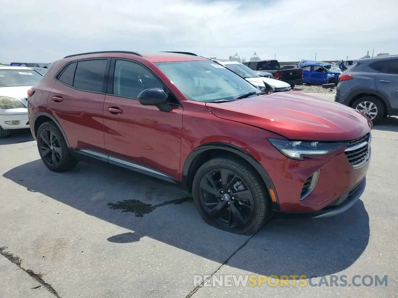 4 fotografías del automóvil dañado LRBFZNR47ND064392 BUICK ENVISION 2022