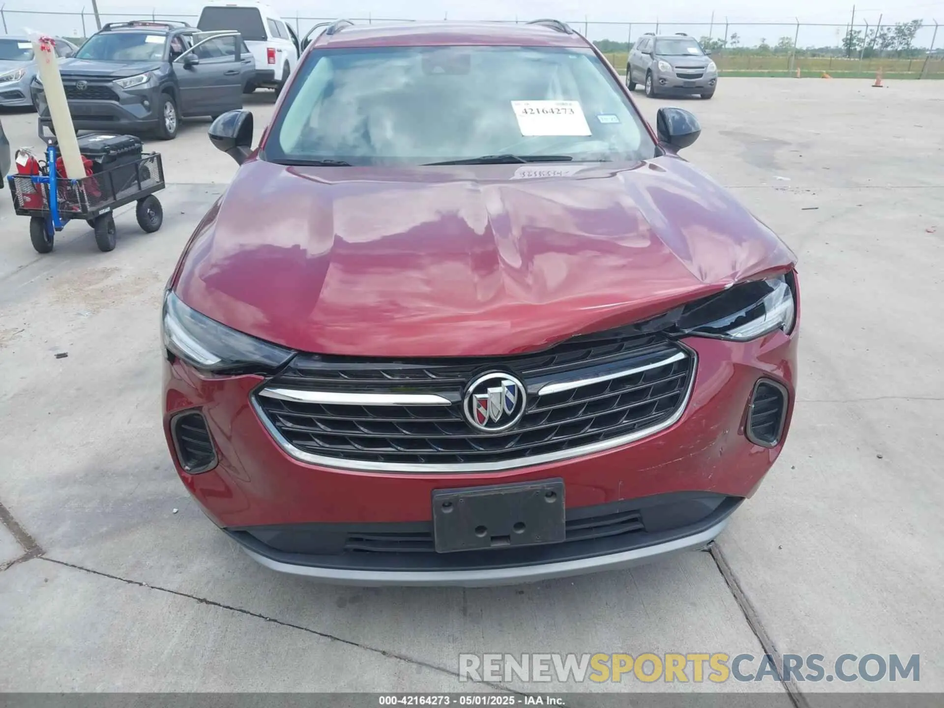 12 fotografías del automóvil dañado LRBFZNR48ND021633 BUICK ENVISION 2022