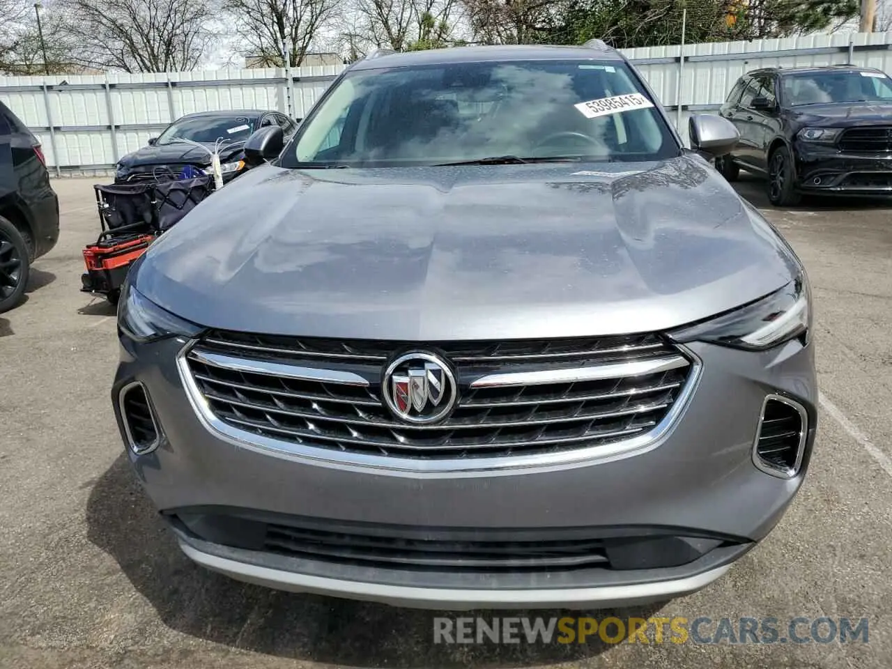 5 fotografías del automóvil dañado LRBFZNR49ND027702 BUICK ENVISION 2022