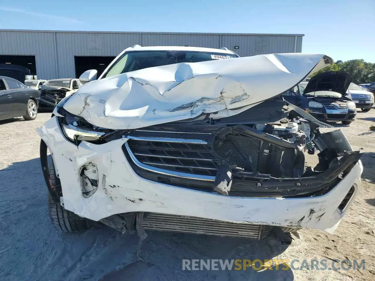 5 fotografías del automóvil dañado LRBAZLR41PD038601 BUICK ENVISION 2023