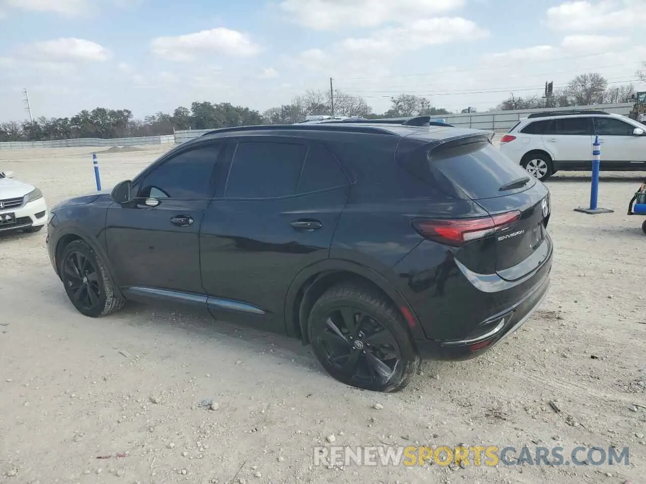 2 fotografías del automóvil dañado LRBAZLR41PD067645 BUICK ENVISION 2023