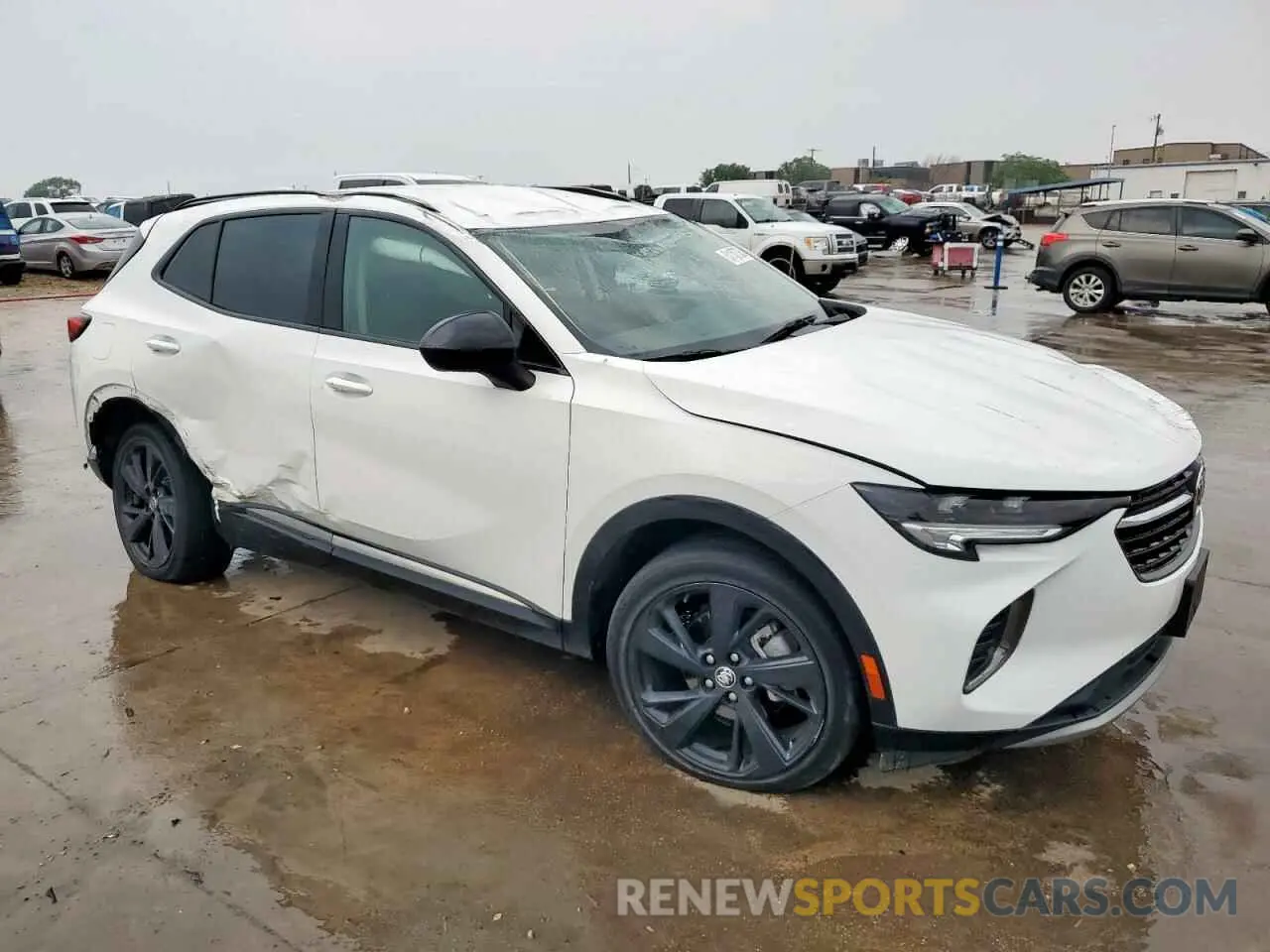 4 fotografías del automóvil dañado LRBAZLR42PD031320 BUICK ENVISION 2023