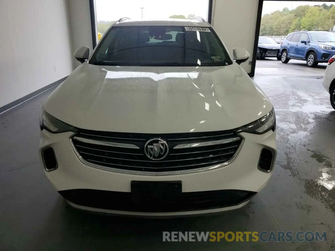 5 fotografías del automóvil dañado LRBAZLR43PD072989 BUICK ENVISION 2023