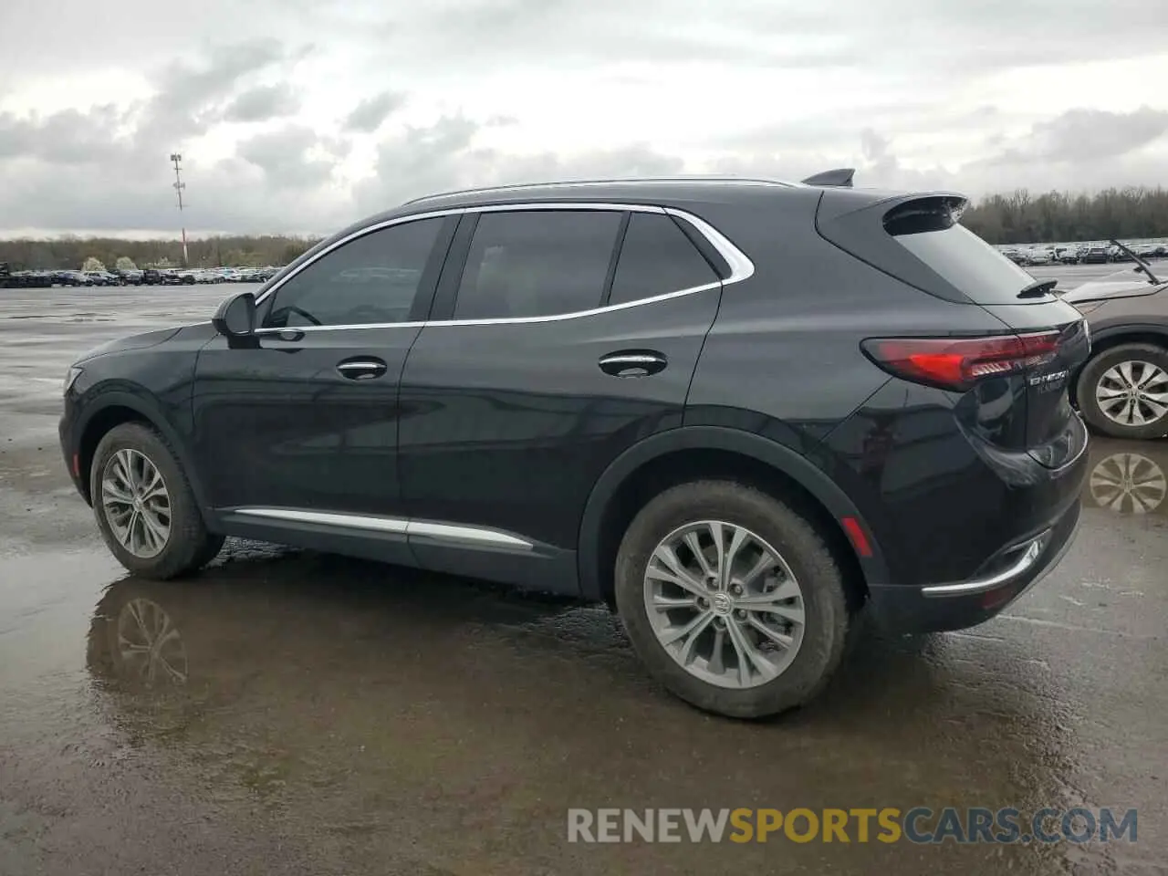 2 fotografías del automóvil dañado LRBAZLR47PD031569 BUICK ENVISION 2023