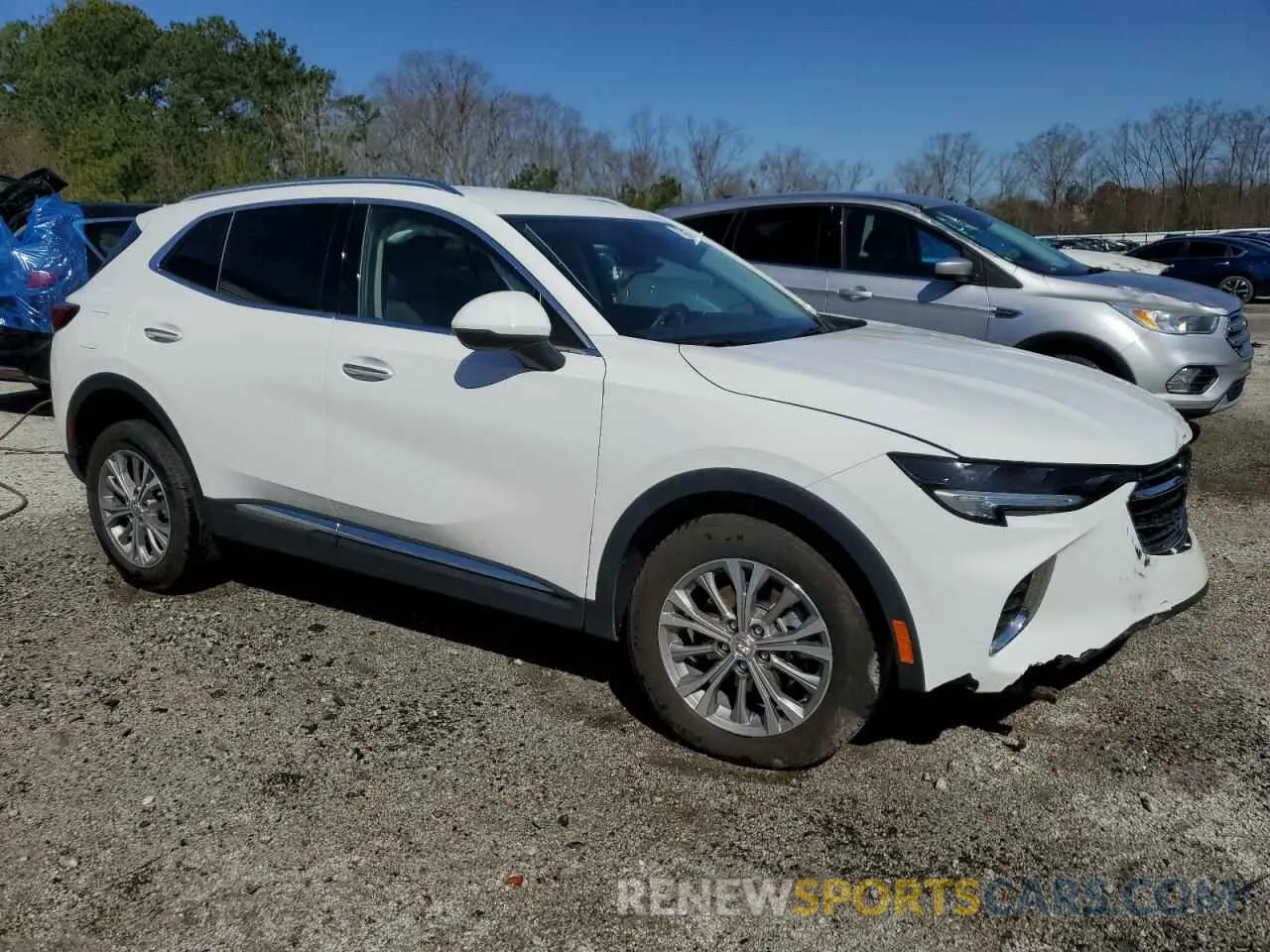 4 fotografías del automóvil dañado LRBAZLR48PD074642 BUICK ENVISION 2023