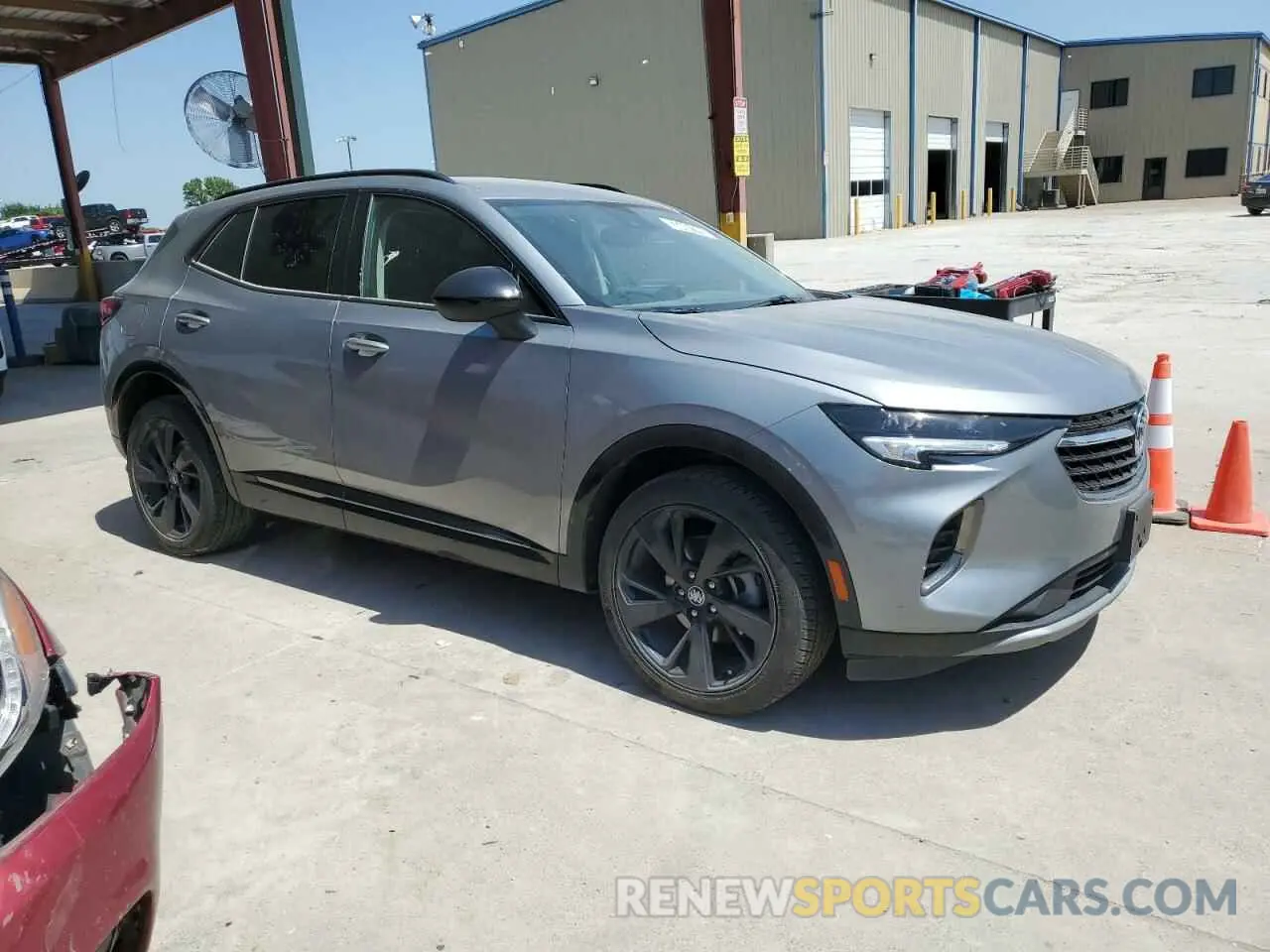4 fotografías del automóvil dañado LRBAZLR48PD098763 BUICK ENVISION 2023