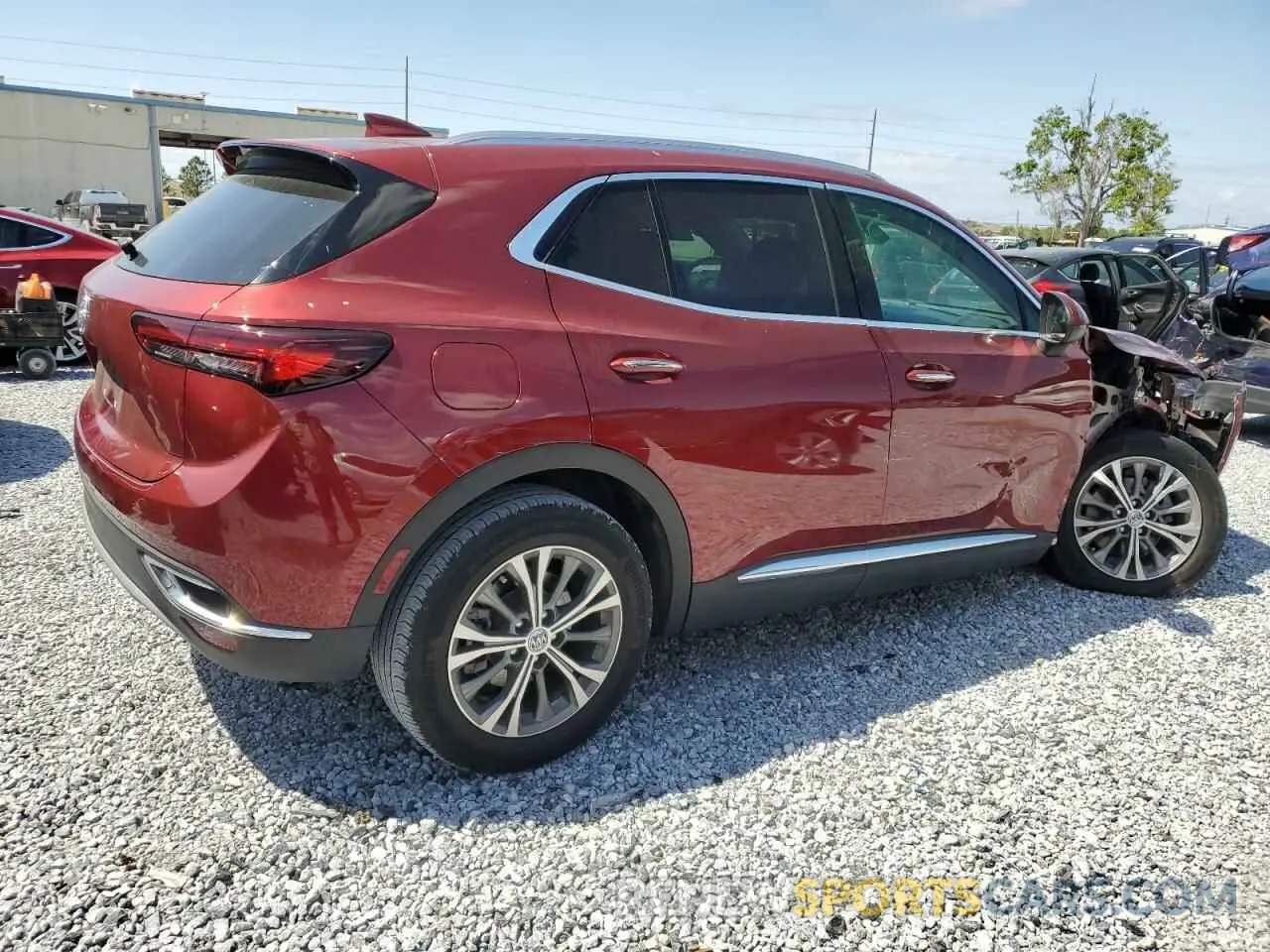 3 fotografías del automóvil dañado LRBAZLR4XPD019237 BUICK ENVISION 2023