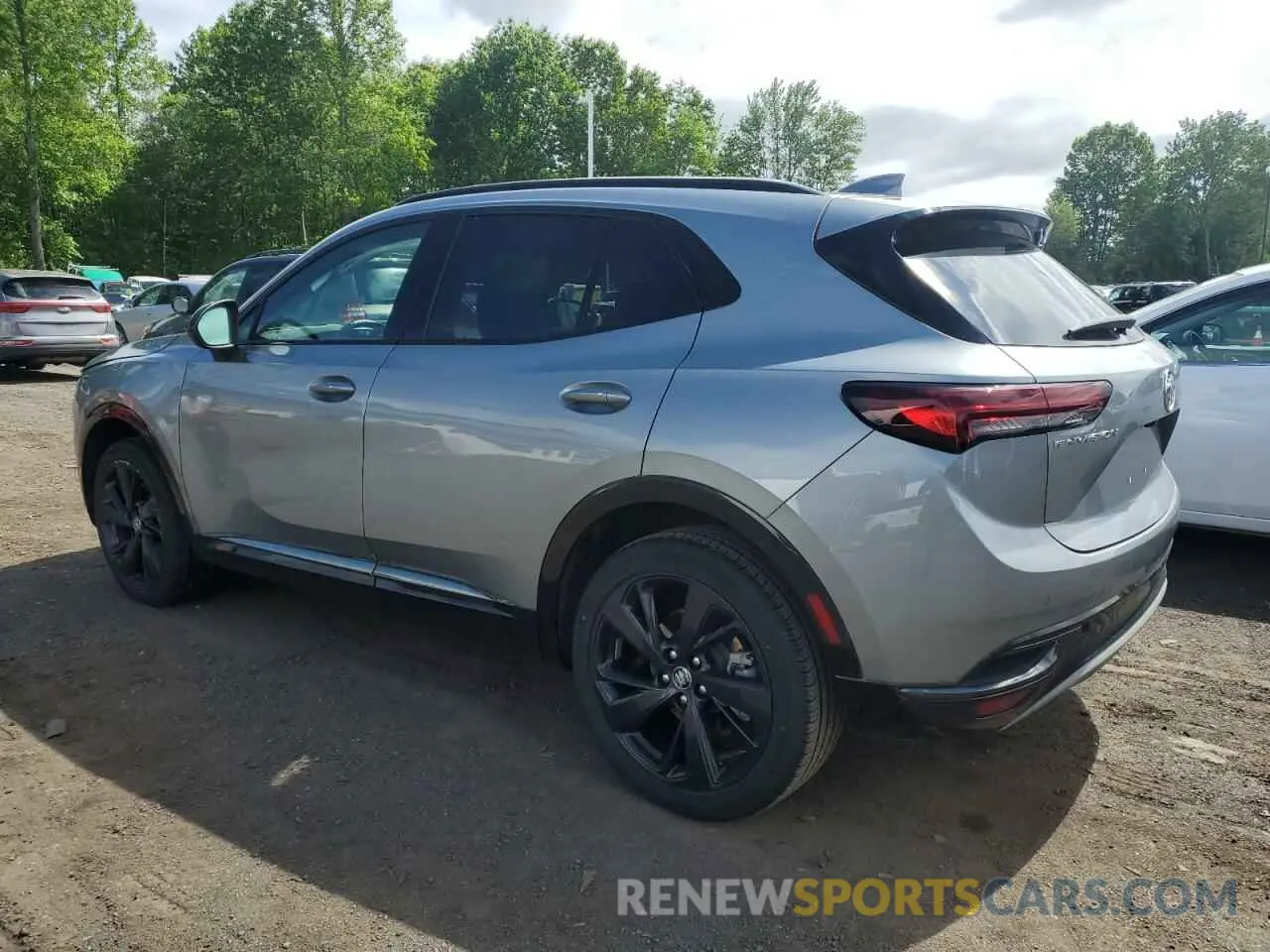 2 fotografías del automóvil dañado LRBFZNR40PD072529 BUICK ENVISION 2023