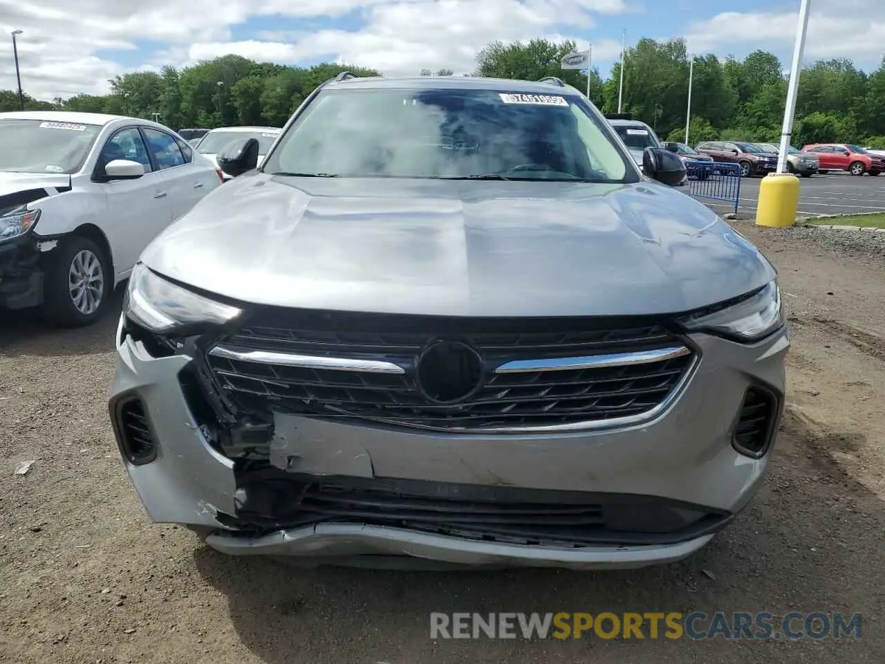 5 fotografías del automóvil dañado LRBFZNR40PD072529 BUICK ENVISION 2023