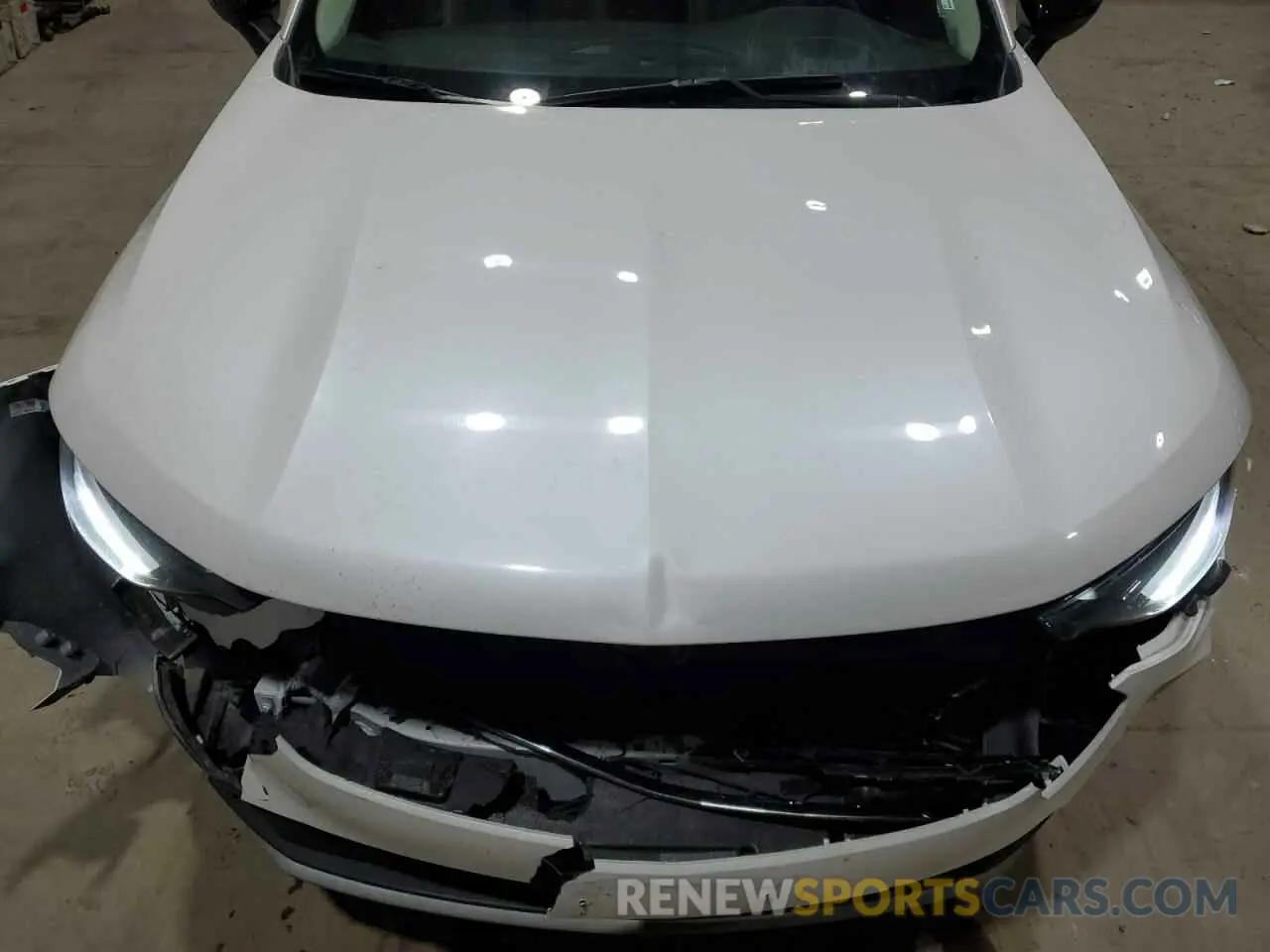 12 fotografías del automóvil dañado LRBFZNR47PD126442 BUICK ENVISION 2023