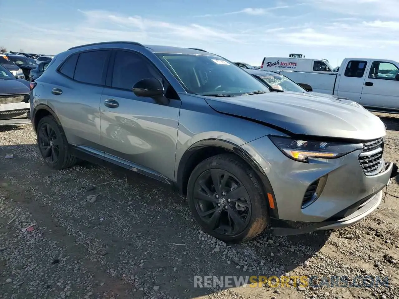 4 fotografías del automóvil dañado LRBFZNR48PD019867 BUICK ENVISION 2023
