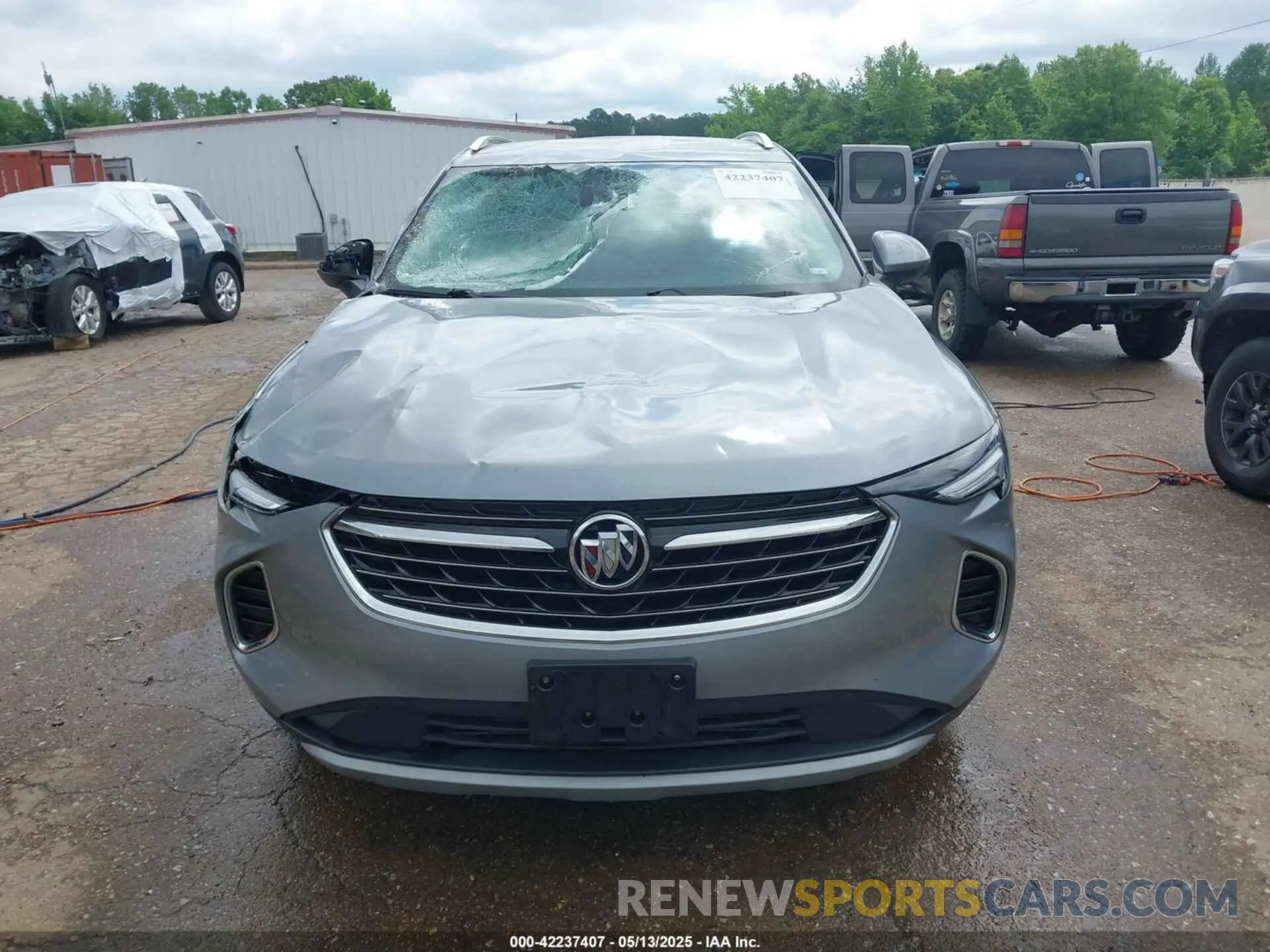 12 fotografías del automóvil dañado LRBFZNR49PD056328 BUICK ENVISION 2023