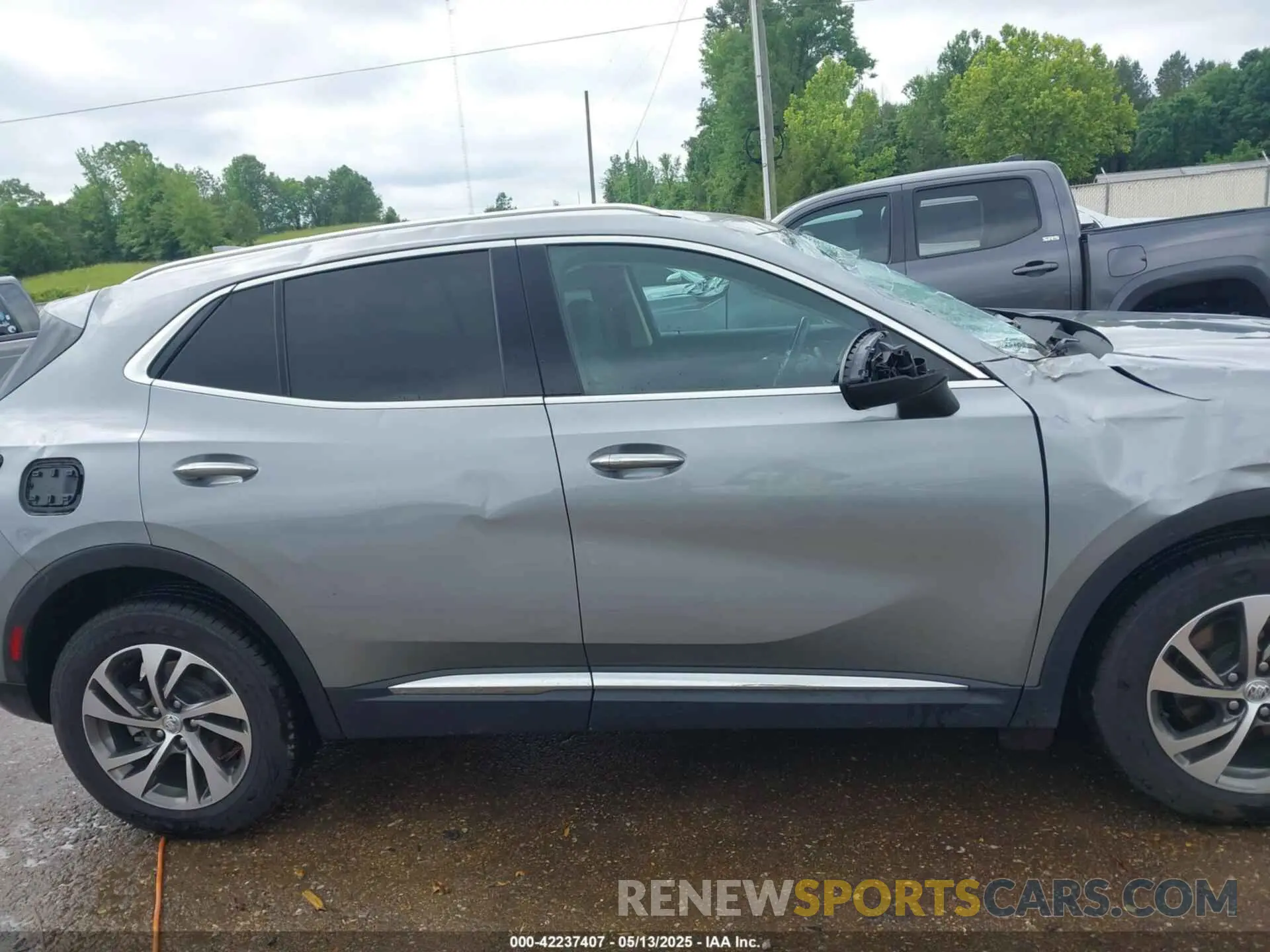 13 fotografías del automóvil dañado LRBFZNR49PD056328 BUICK ENVISION 2023
