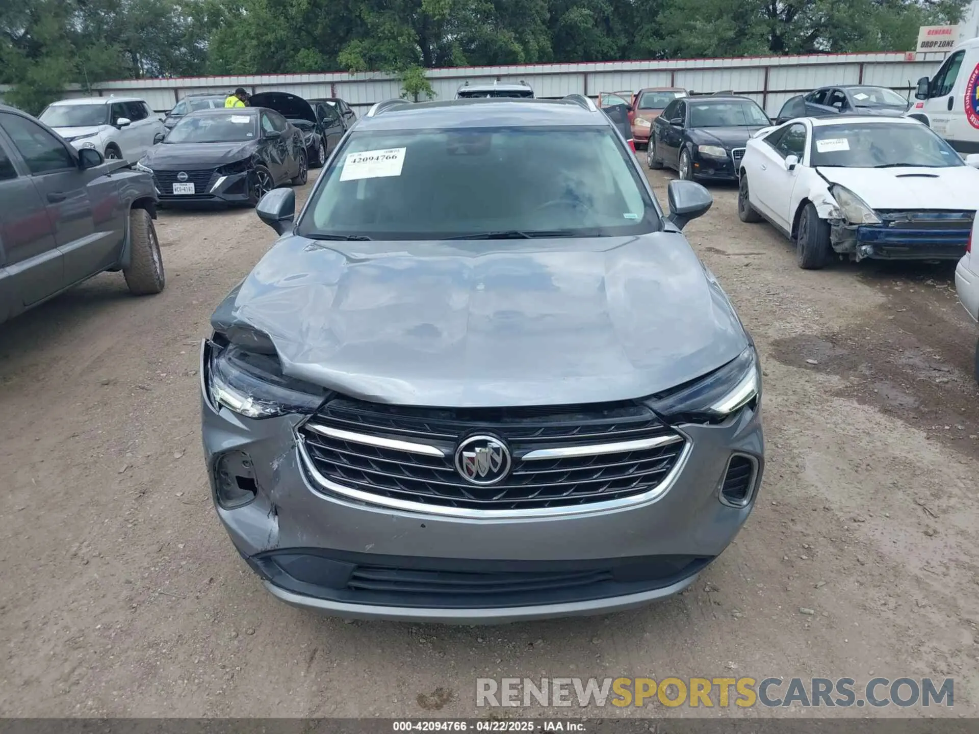 12 fotografías del automóvil dañado LRBFZNR4XPD056225 BUICK ENVISION 2023