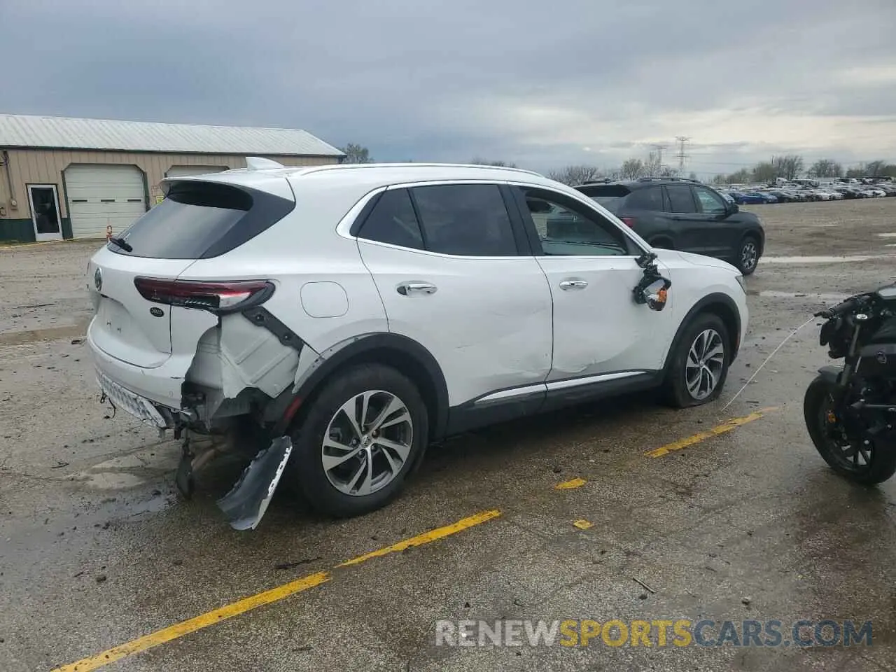 3 fotografías del automóvil dañado LRBFZNR4XPD098507 BUICK ENVISION 2023