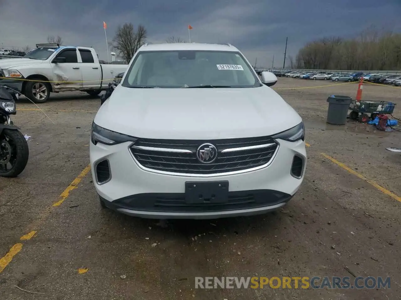 5 fotografías del automóvil dañado LRBFZNR4XPD098507 BUICK ENVISION 2023