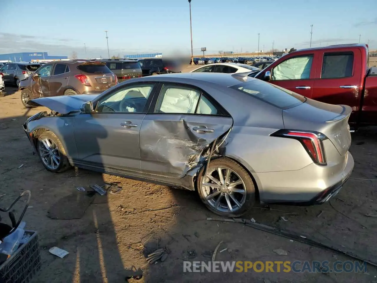 2 fotografías del automóvil dañado 1G6DG5RK6R0100179 CADILLAC CT4 2024