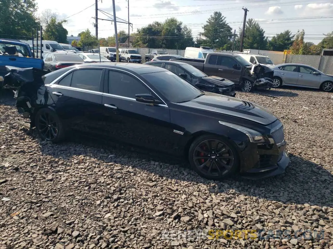 4 fotografías del automóvil dañado 1G6A15S69K0132860 CADILLAC CTS 2019