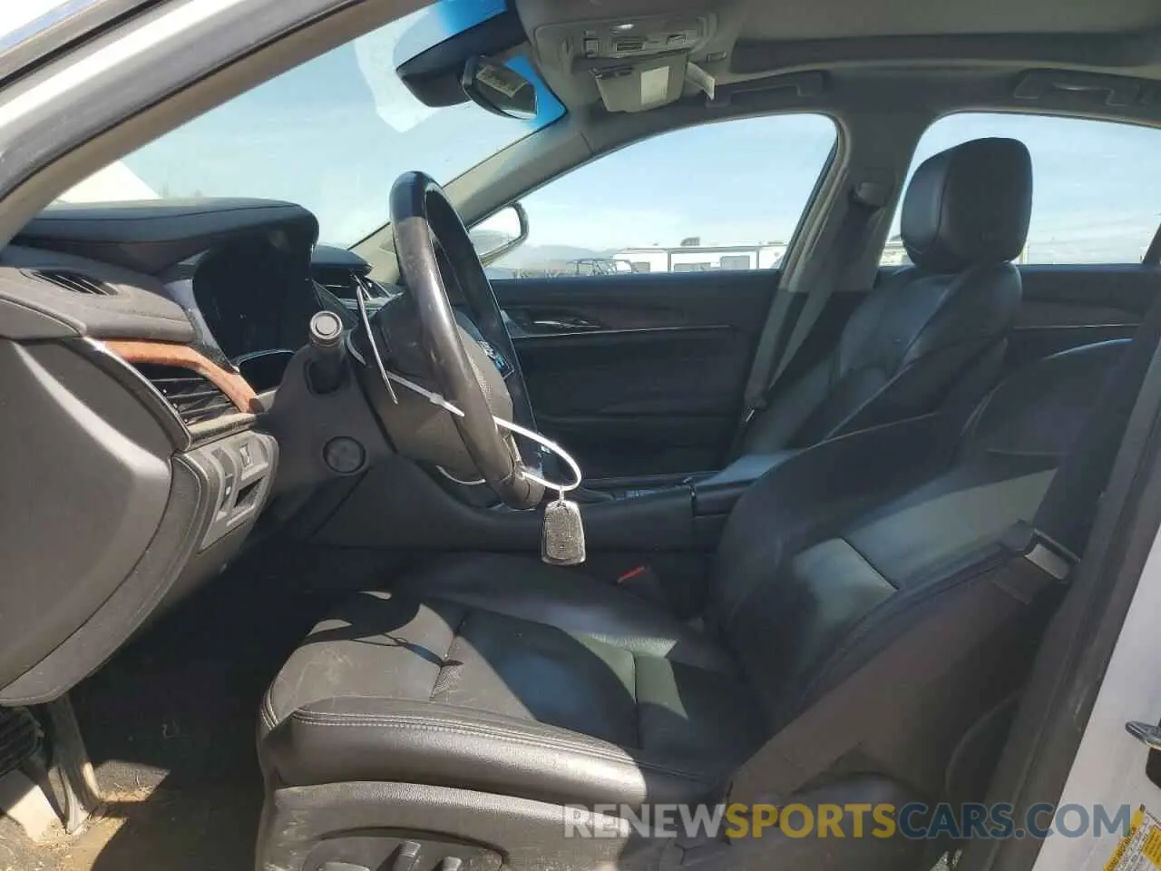 7 fotografías del automóvil dañado 1G6AX5SX6K0128899 CADILLAC CTS 2019
