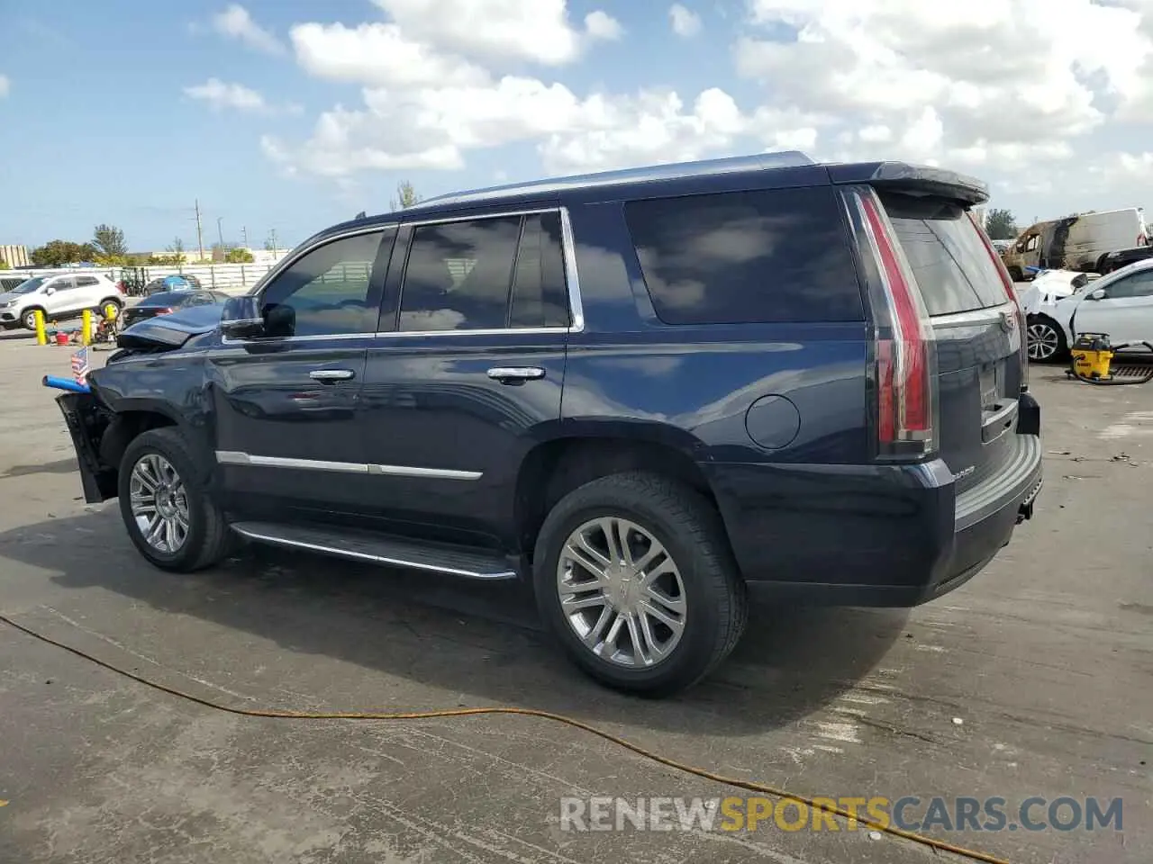 2 fotografías del automóvil dañado 1GYS3AKJ6KR324090 CADILLAC ESCALADE 2019
