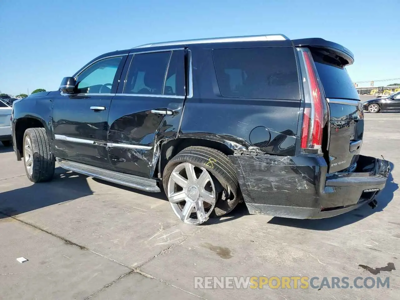 2 fotografías del automóvil dañado 1GYS3BKJ0KR272557 CADILLAC ESCALADE 2019