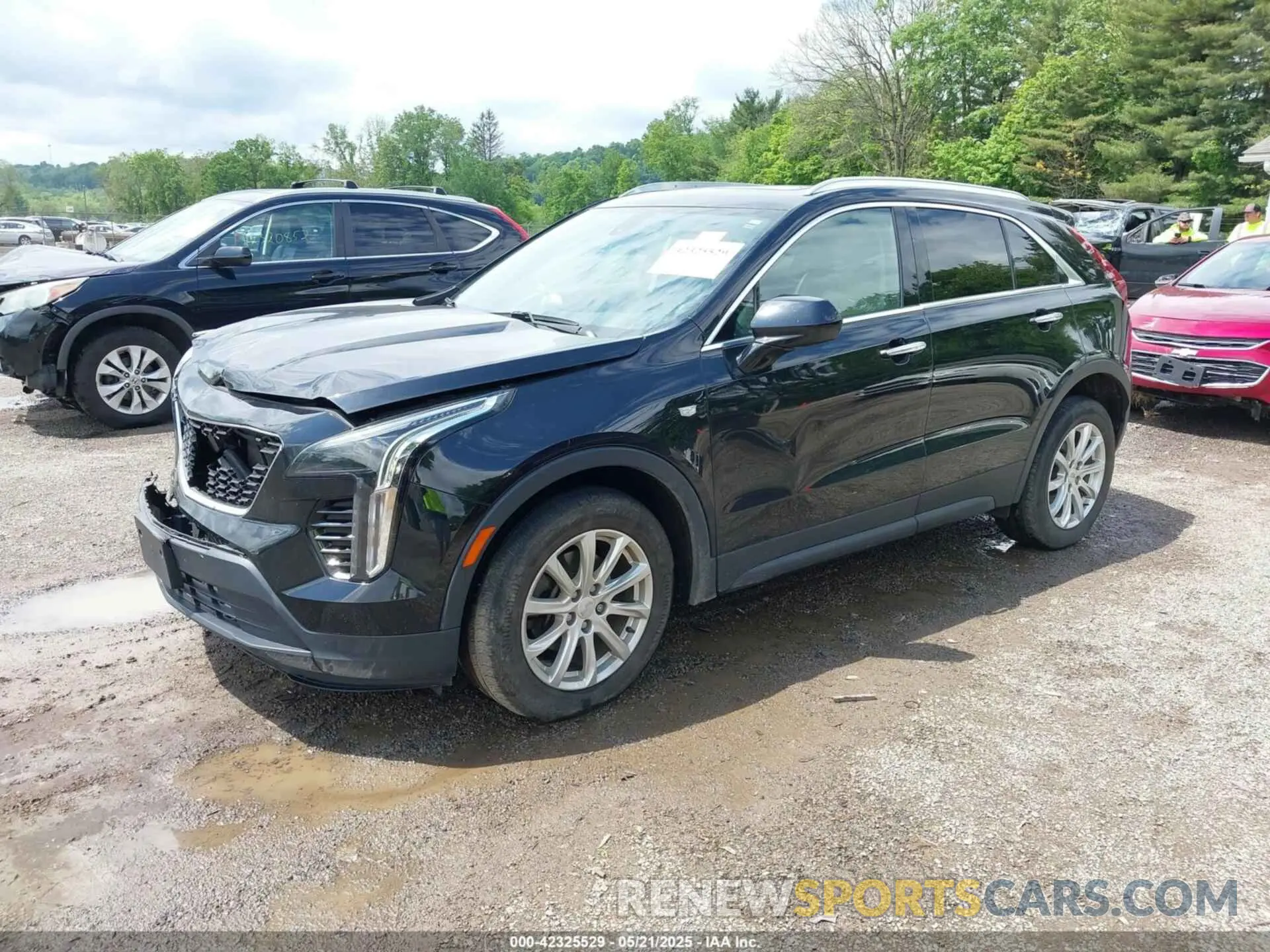 2 fotografías del automóvil dañado 1GYFZBR41KF150209 CADILLAC XT4 2019