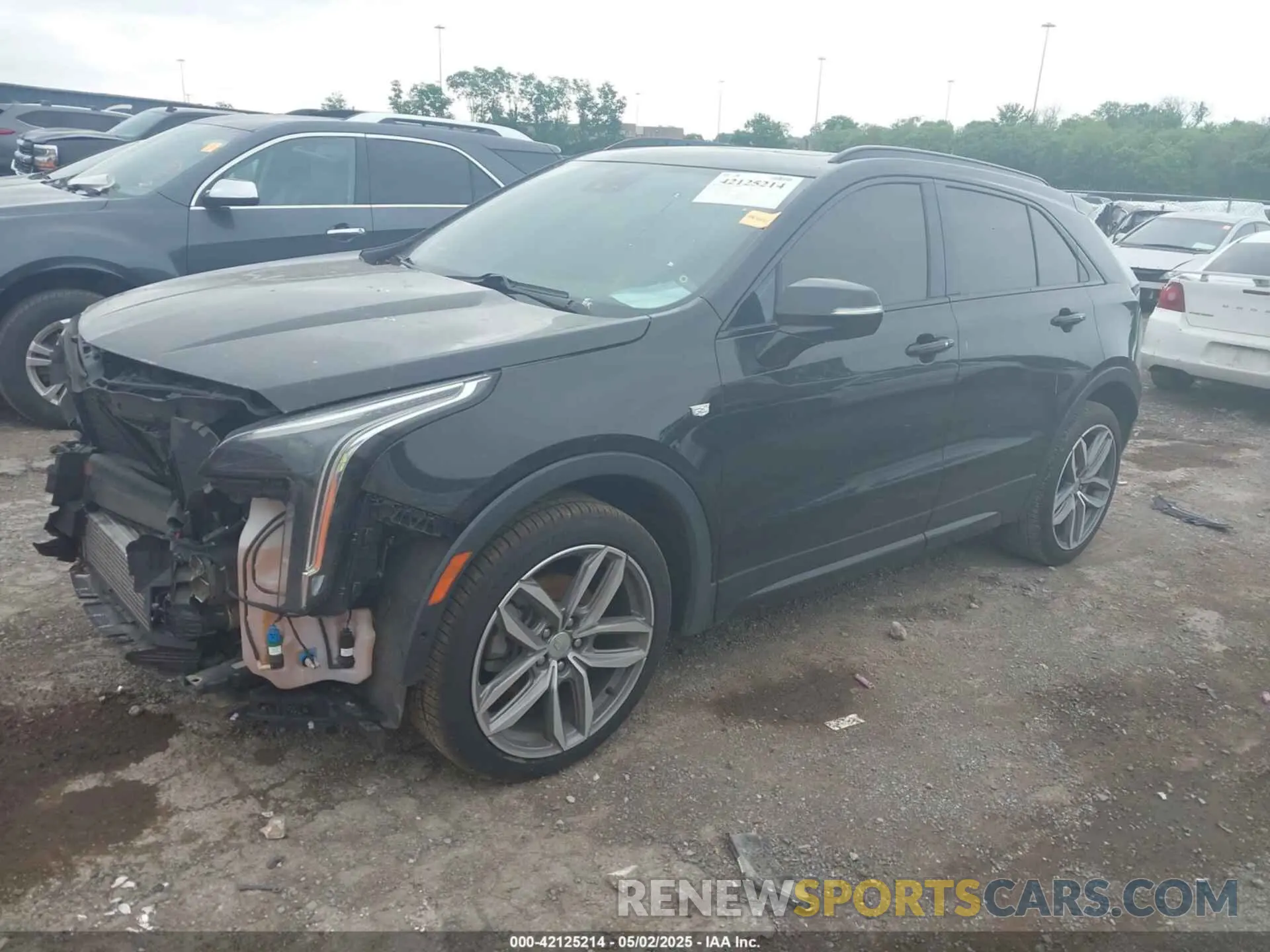 2 fotografías del automóvil dañado 1GYFZER48KF102076 CADILLAC XT4 2019