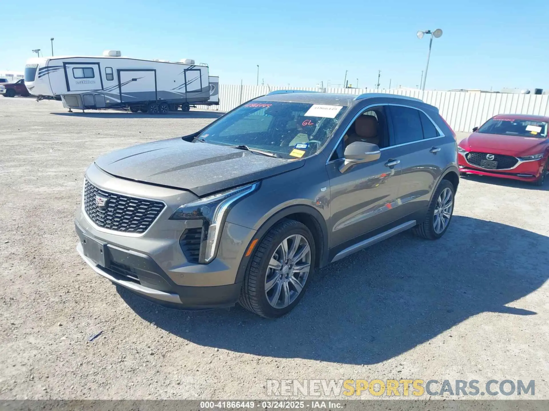 2 fotografías del automóvil dañado 1GYFZCR47LF052986 CADILLAC XT4 2020