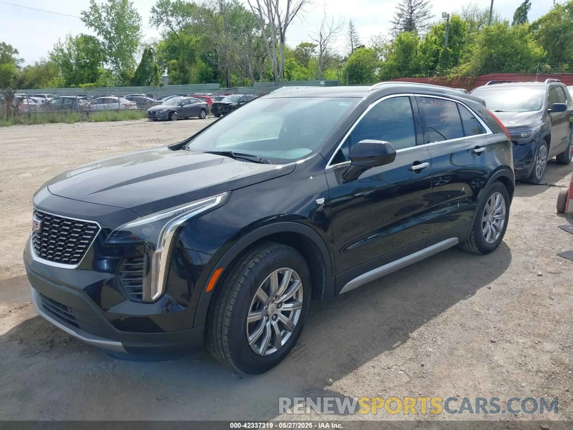 2 fotografías del automóvil dañado 1GYFZDR4XLF081159 CADILLAC XT4 2020