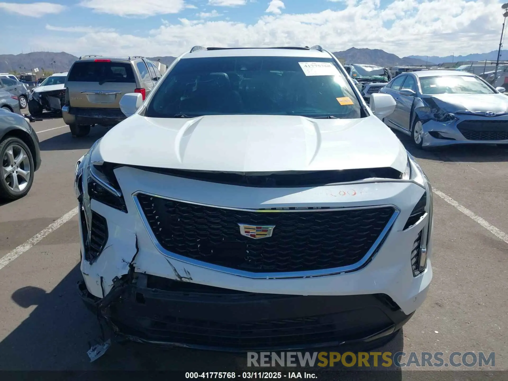 12 fotografías del automóvil dañado 1GYFZFR48LF122917 CADILLAC XT4 2020