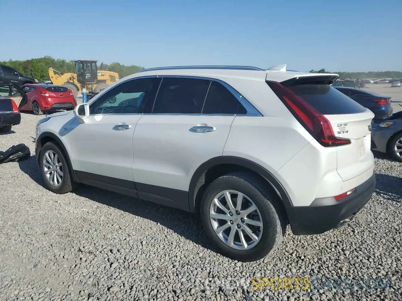 2 fotografías del automóvil dañado 1GYAZAR46MF000278 CADILLAC XT4 2021